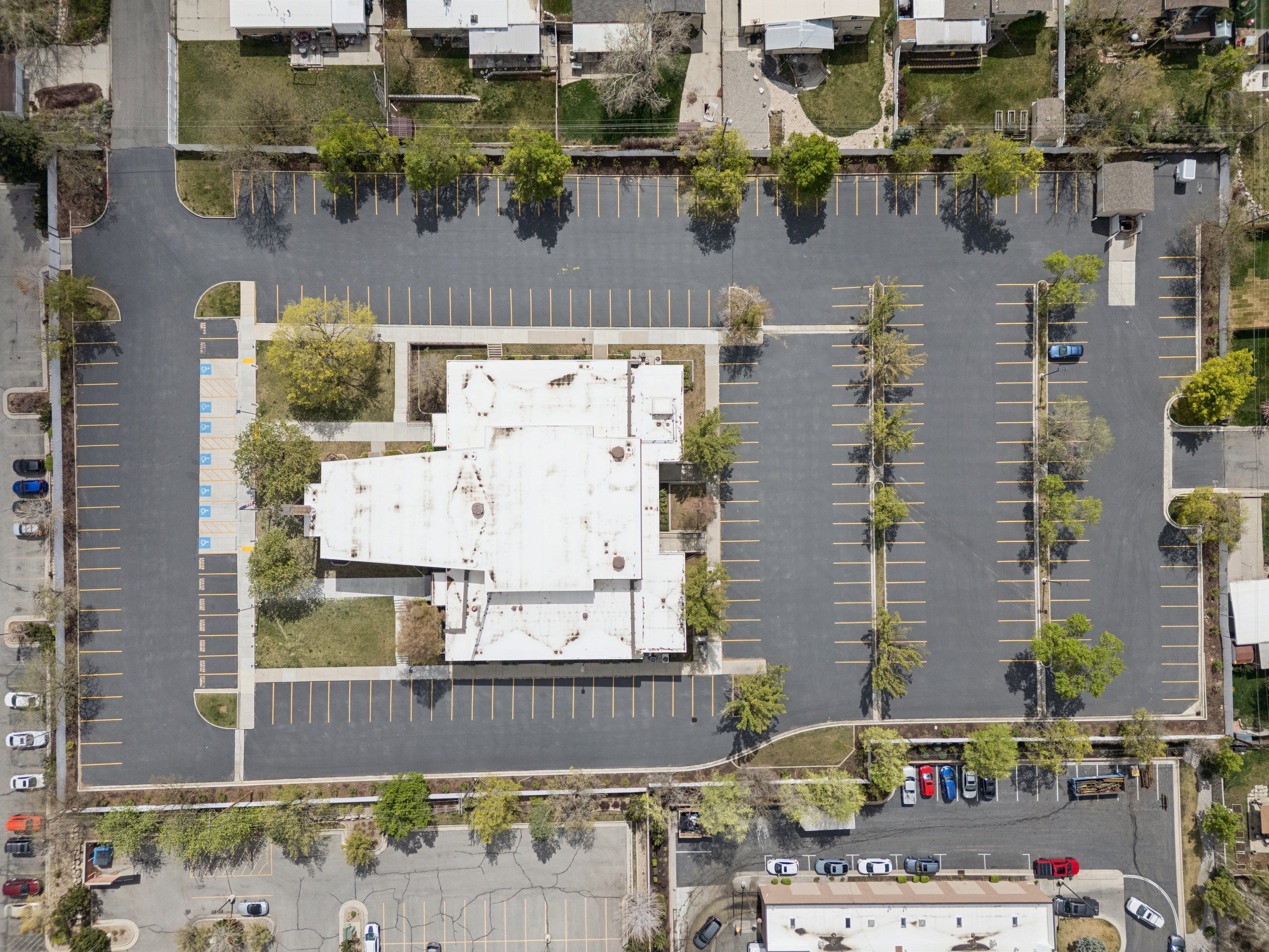 Extensive paved parking lot surrounding the only structure on the property.