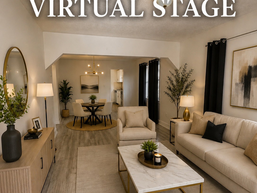 Spacious living area featuring wood-finish flooring, recessed lighting, and an open entryway to a dining space