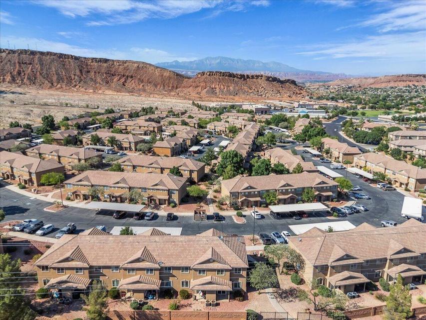 Expansive residential community featuring multiple buildings with terracotta-style roof tiles