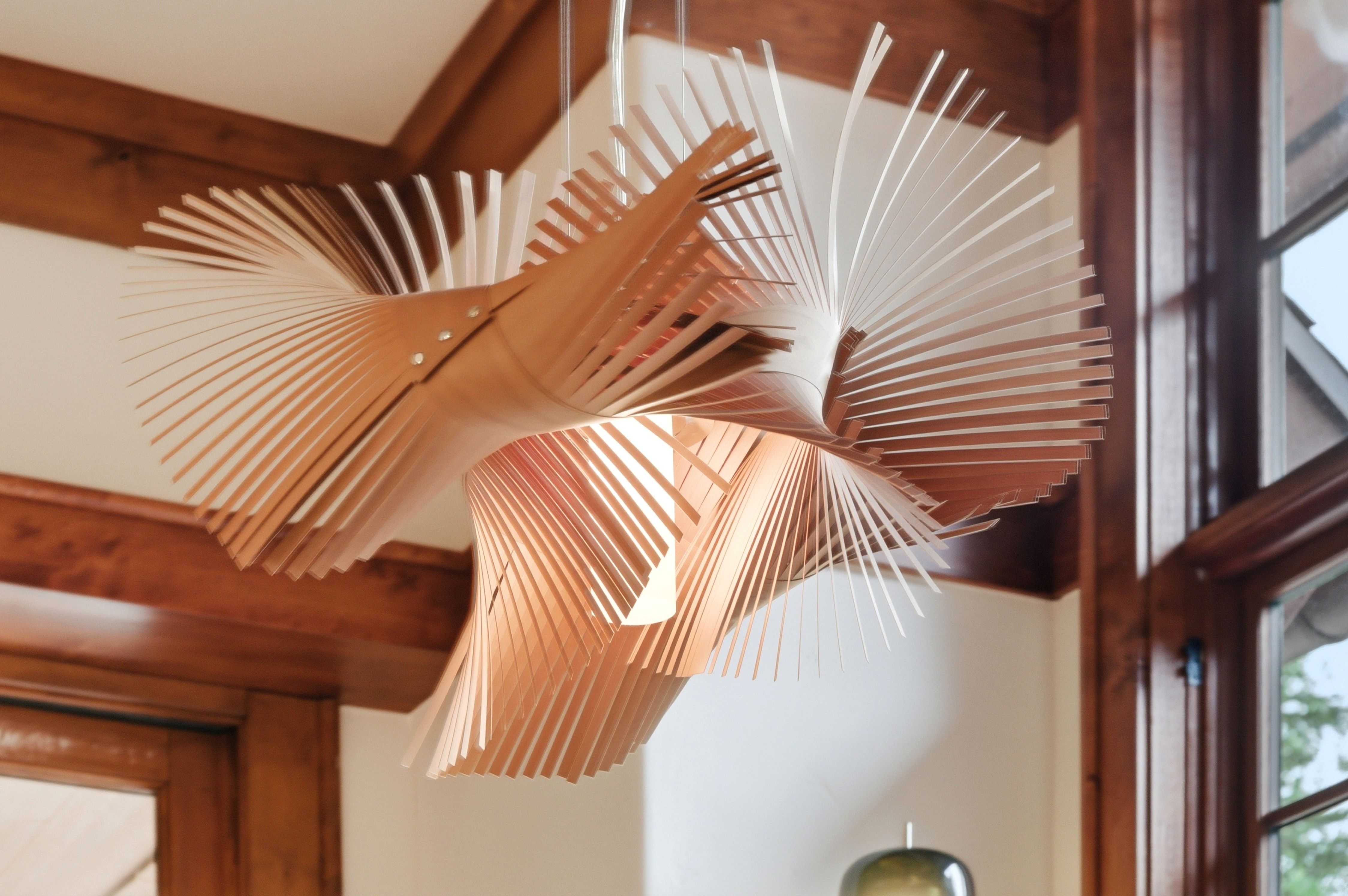 Artistic wood-slat pendant light fixture