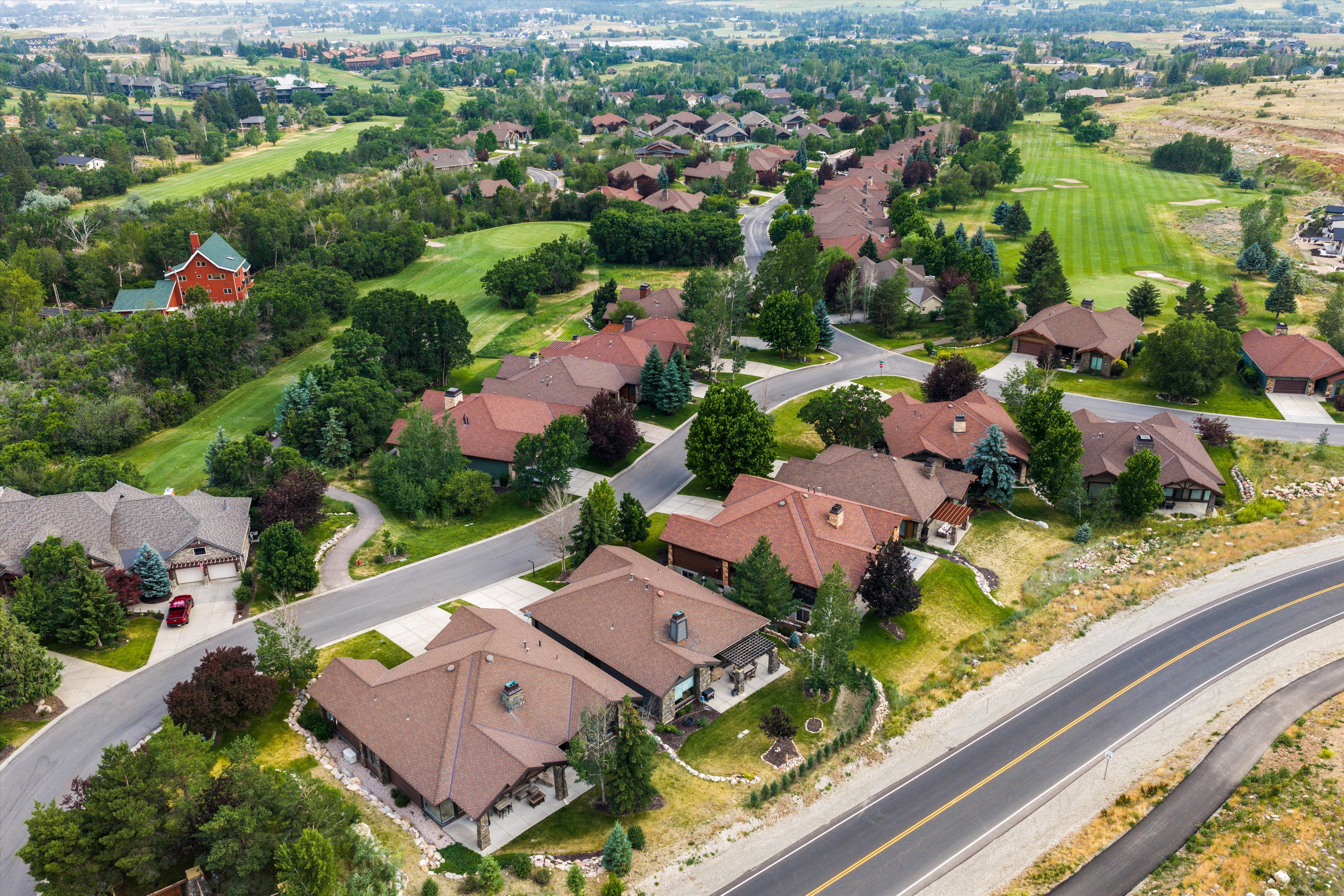 Residential community featuring varied architectural styles and mature landscaping