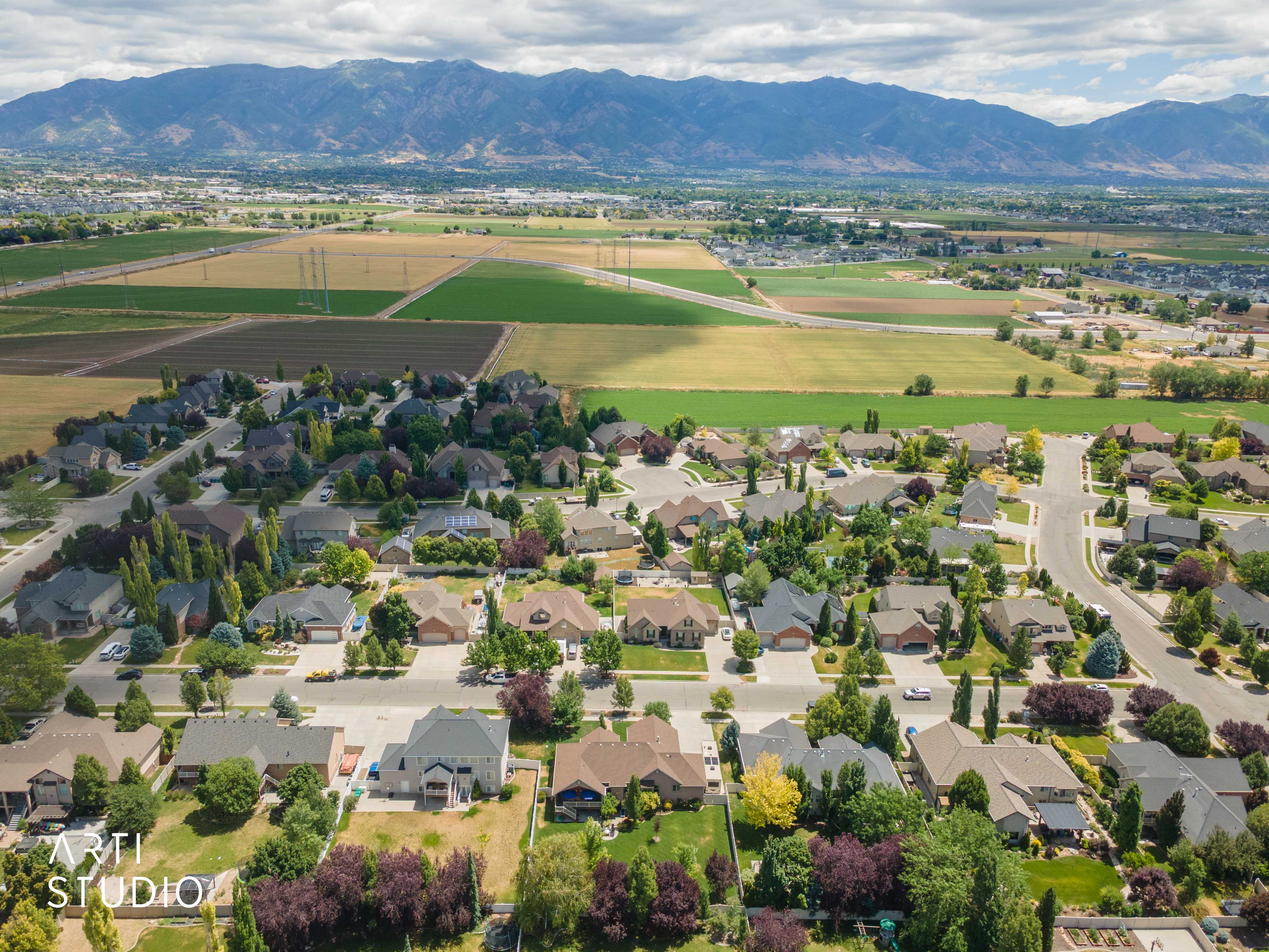 Aerial perspective showcasing neighborhood with varied architectural styles