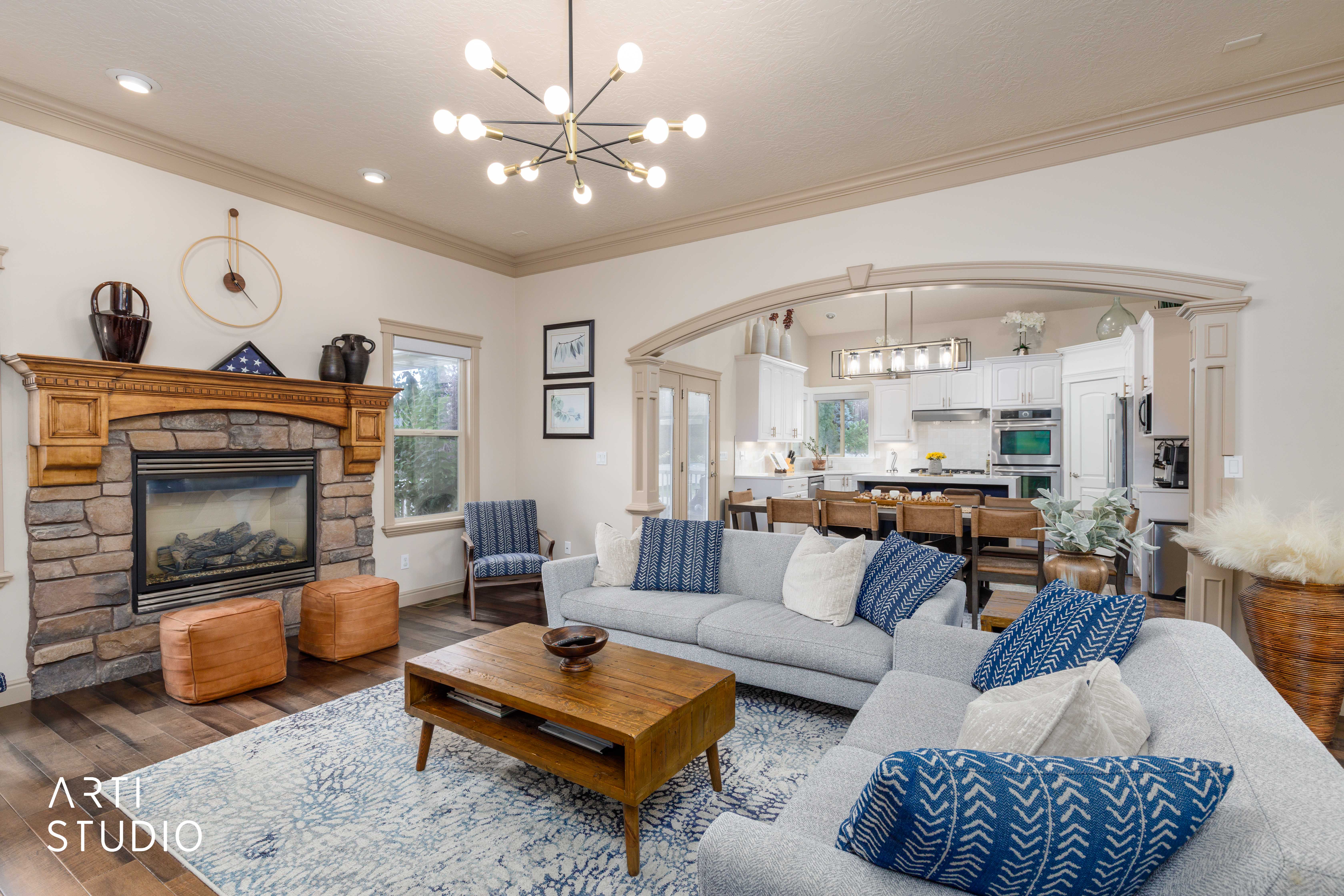 open-concept great room seamlessly connects the living area, dining space, and gourmet kitchen