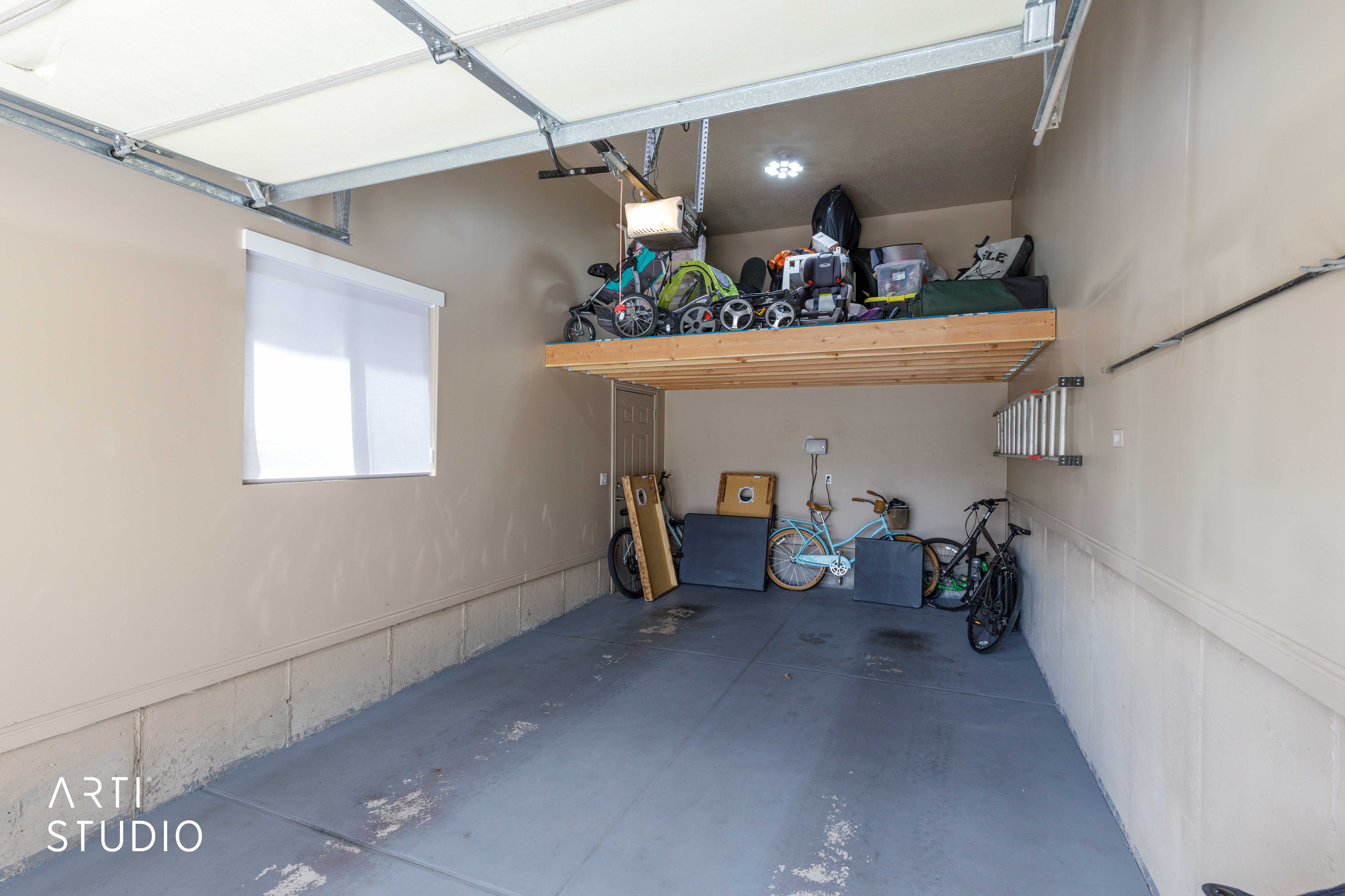 Single bay Garage featuring extra height and additional storage area
