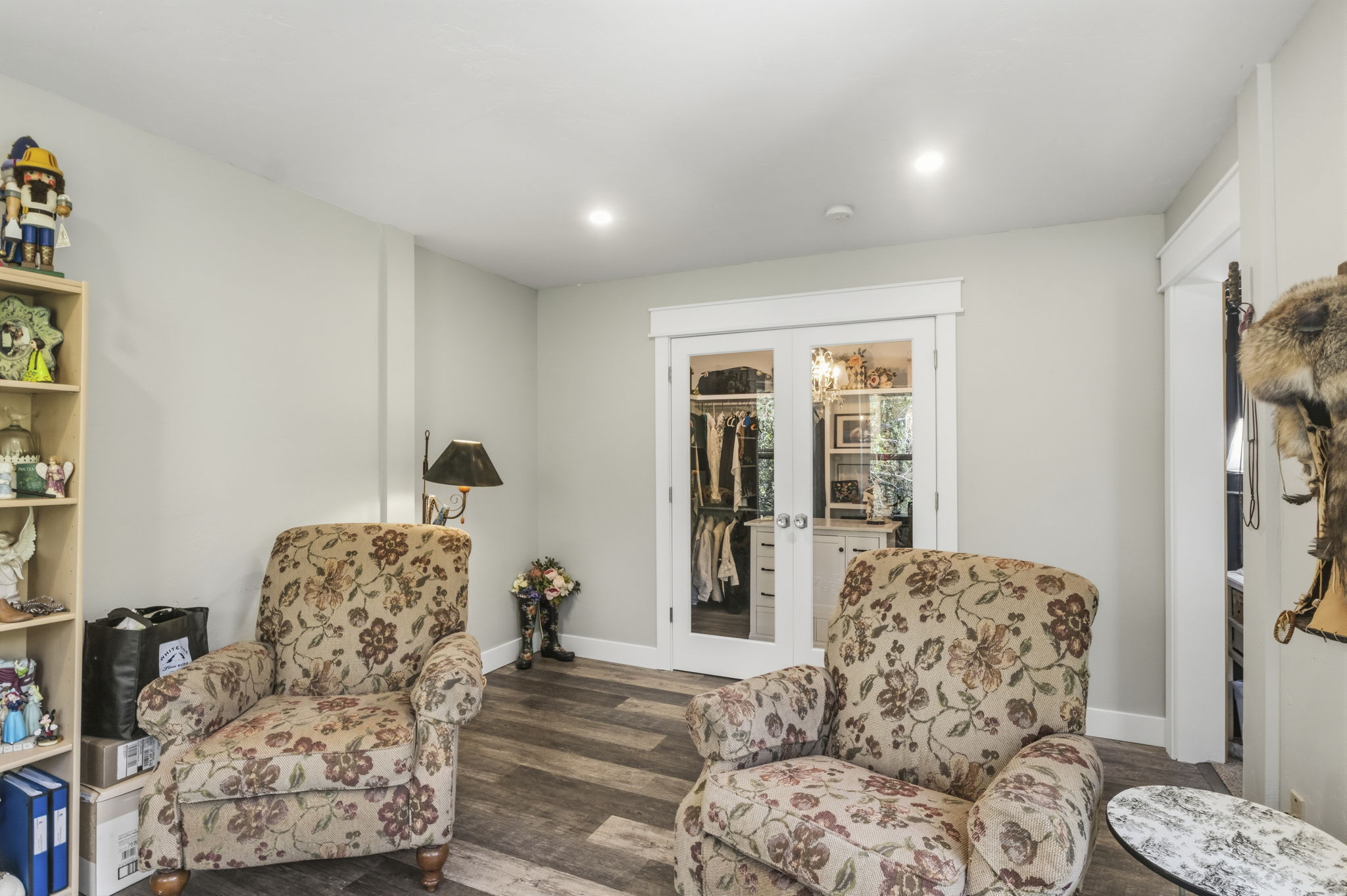 Room featuring wood-finish flooring and light gray walls