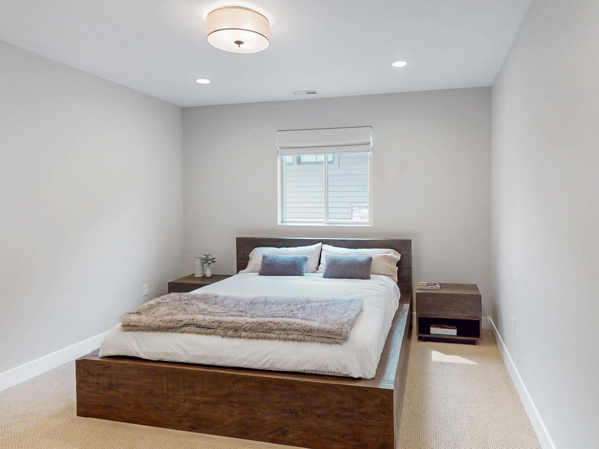 Bedroom #3 features recessed lighting and a central ceiling fixture and  light-colored carpet, a window with blinds, and white baseboards