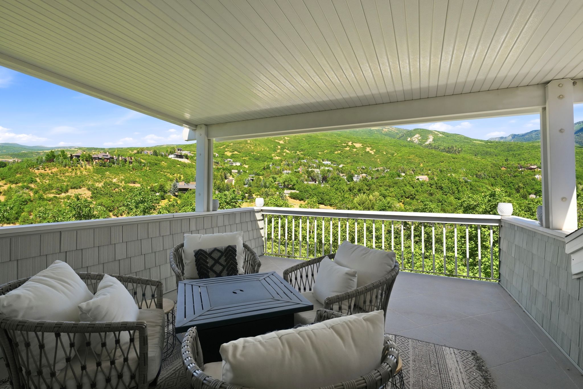 Master Private Deck Sitting Area, Covered patio featuring a slatted ceiling and white railing