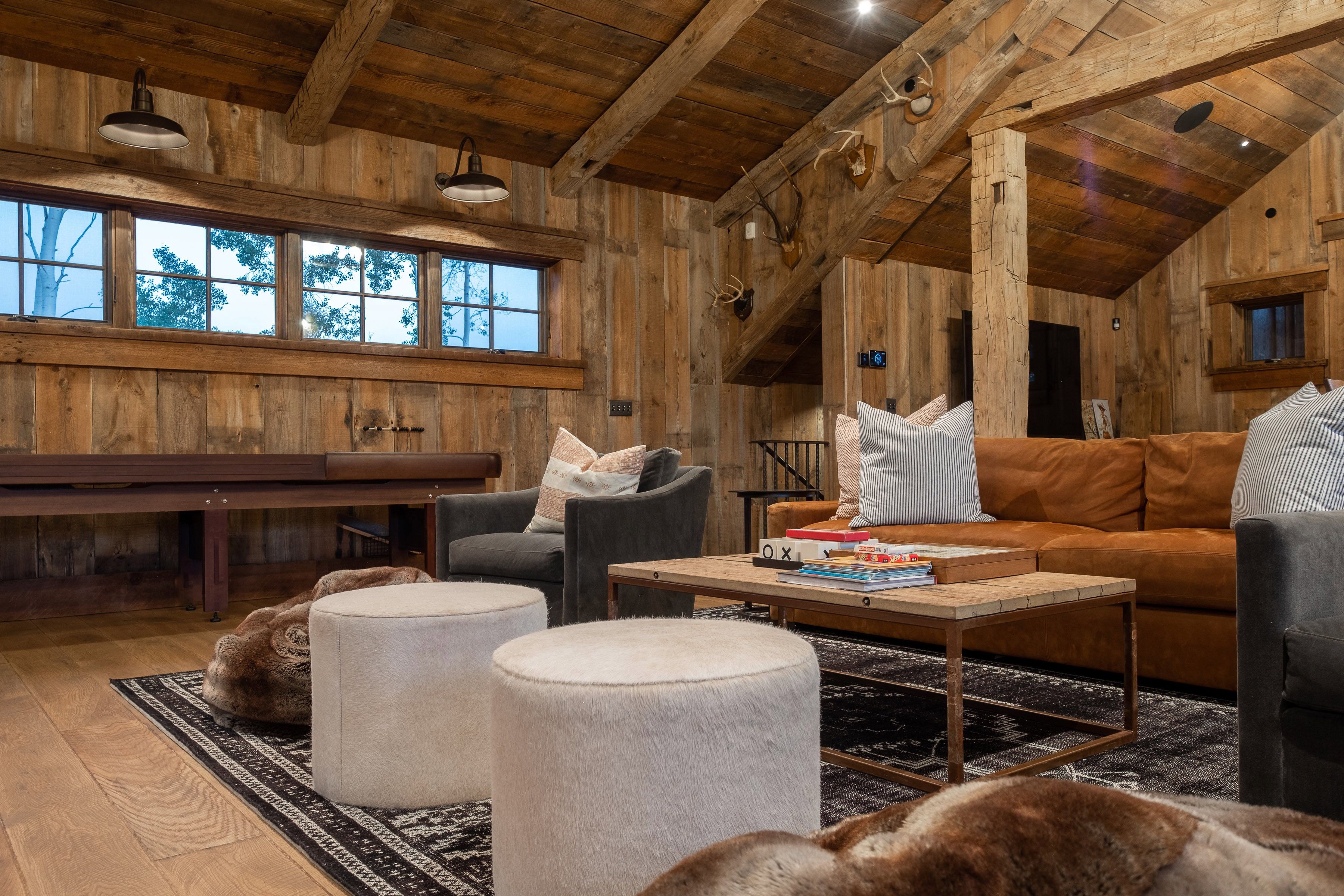 Vaulted wood-paneled ceilings with exposed beams