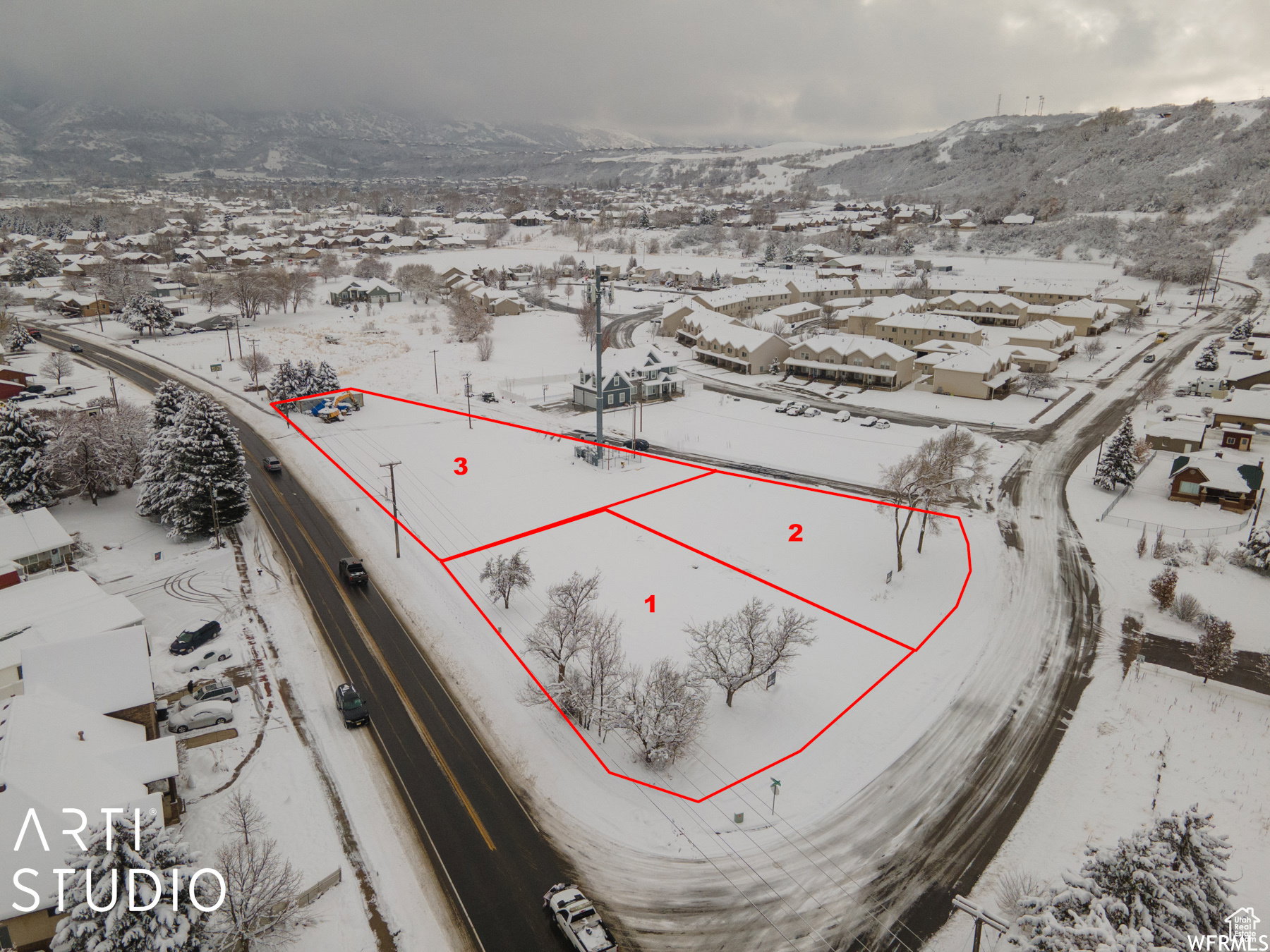 Expansive land parcel featuring direct road frontage and three distinct sections