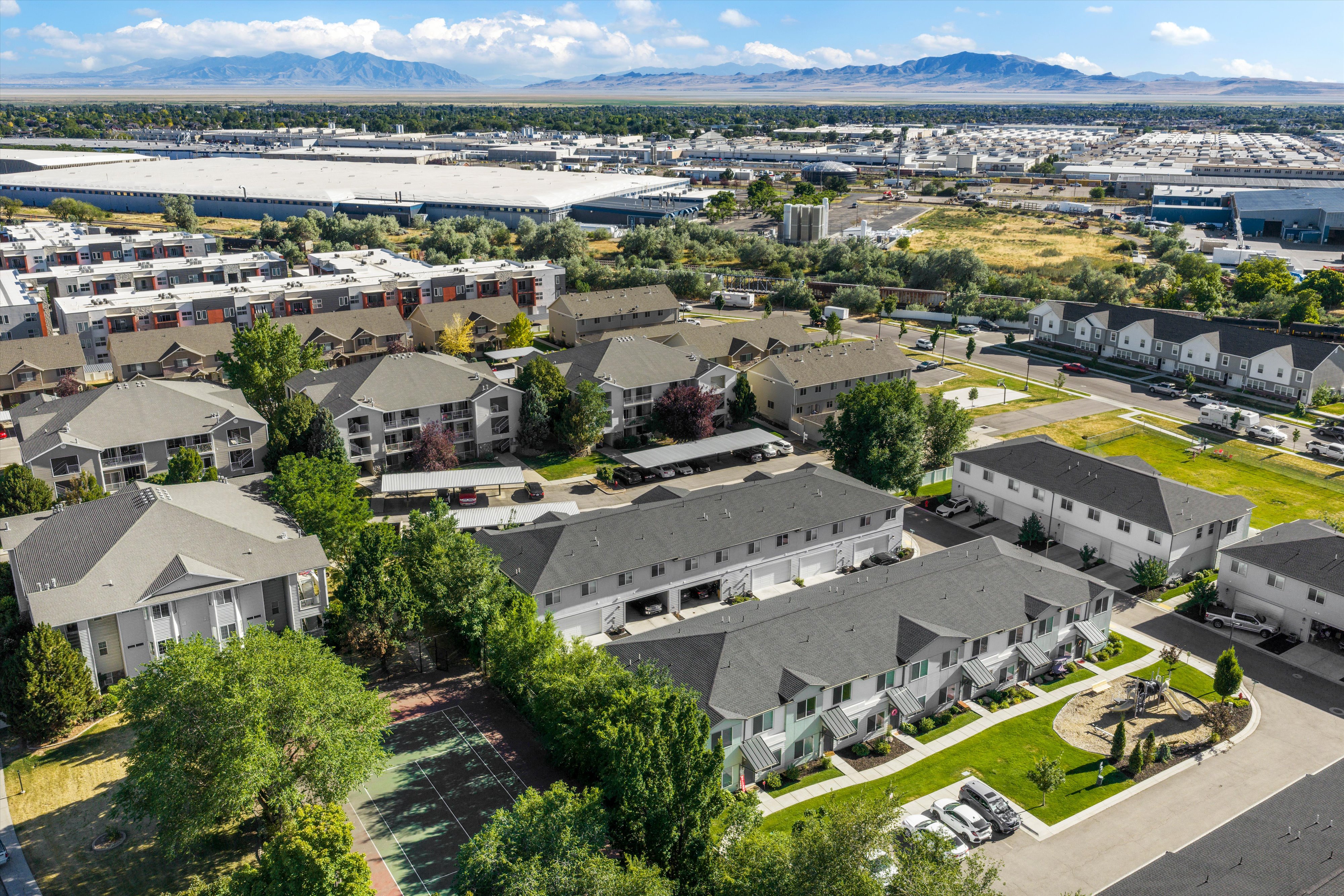 Expansive aerial showcasing a residential community with diverse housing types