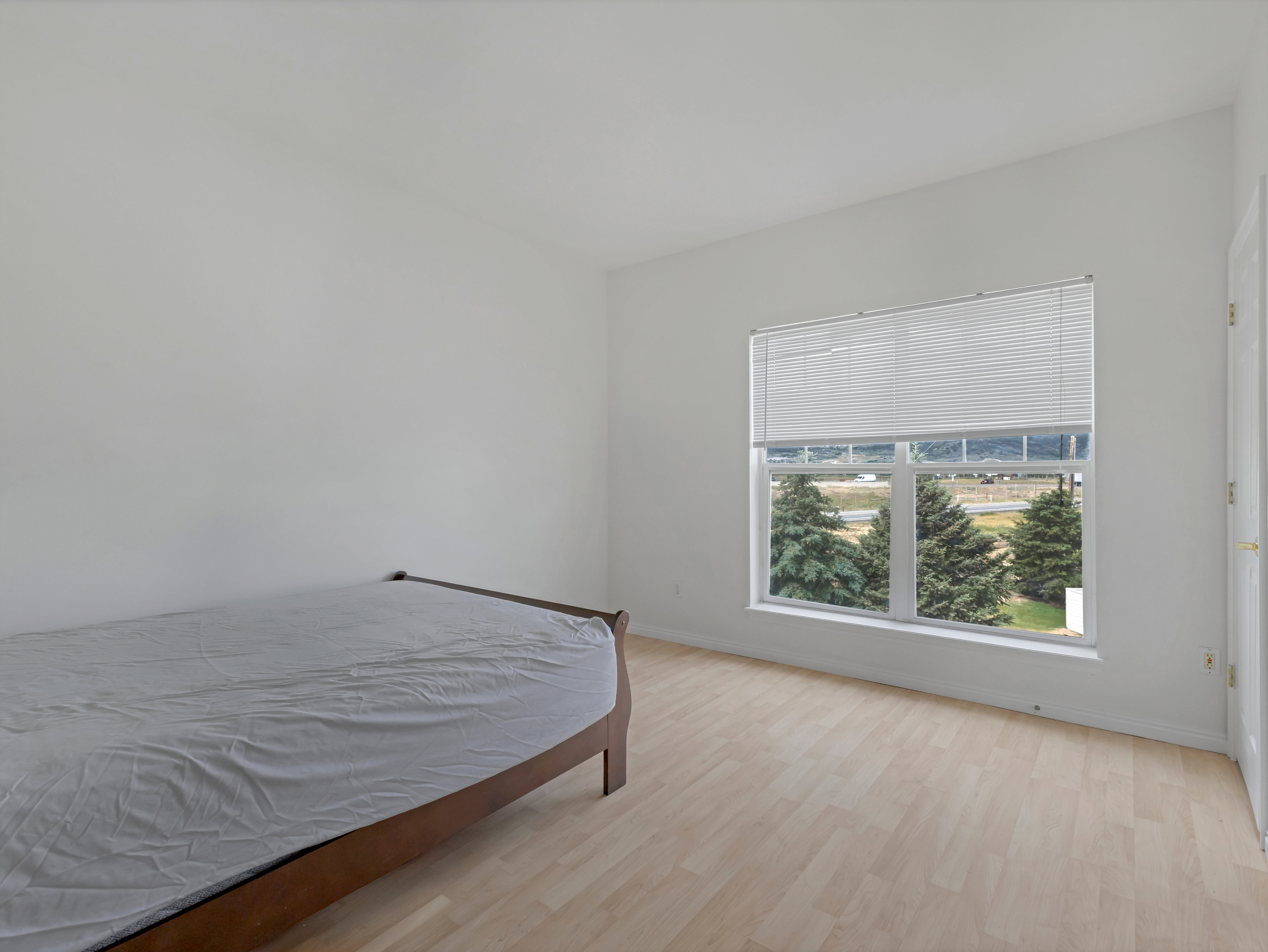 Bright interior space featuring light wood-finish flooring