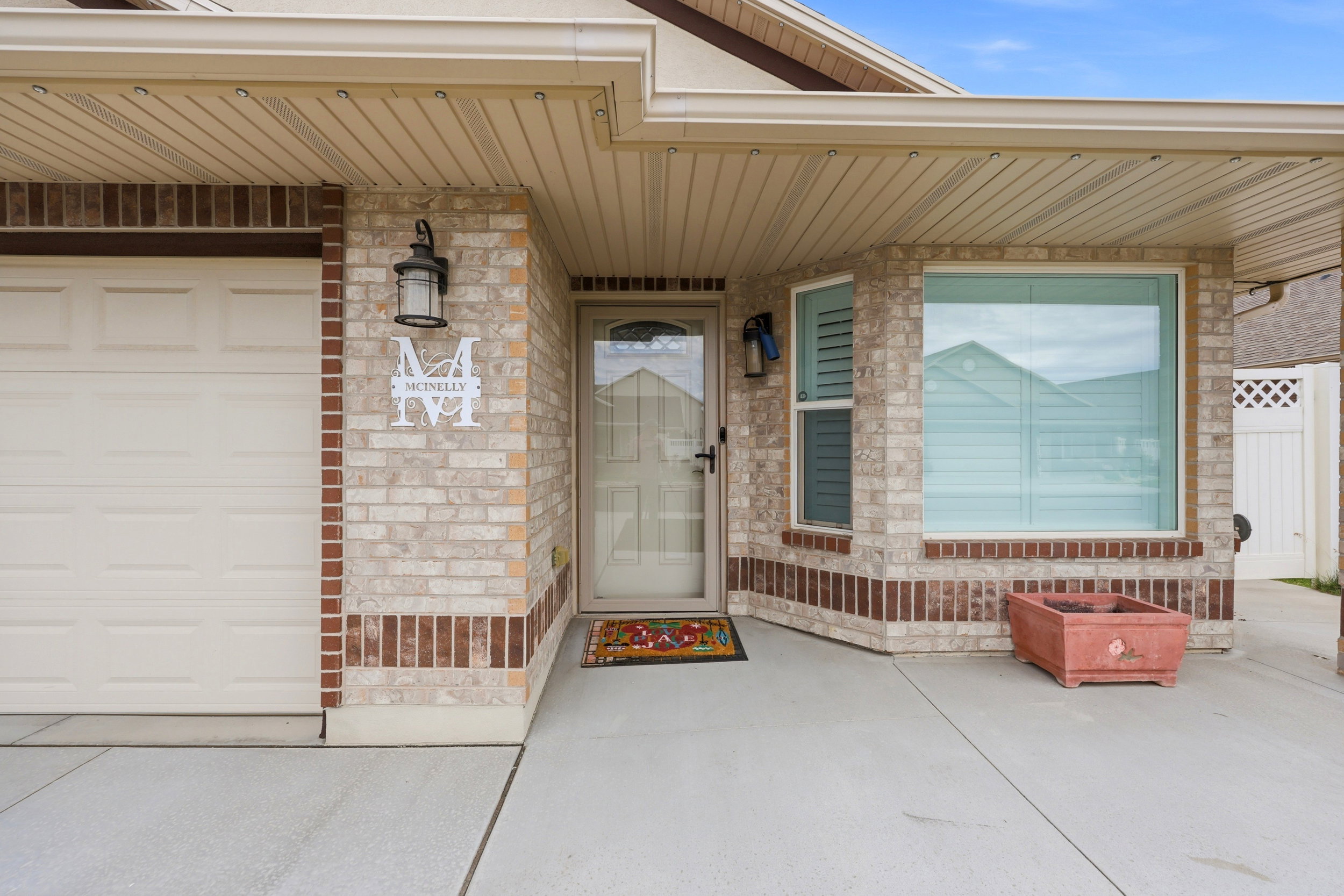 Covered front porch with walk to side gate