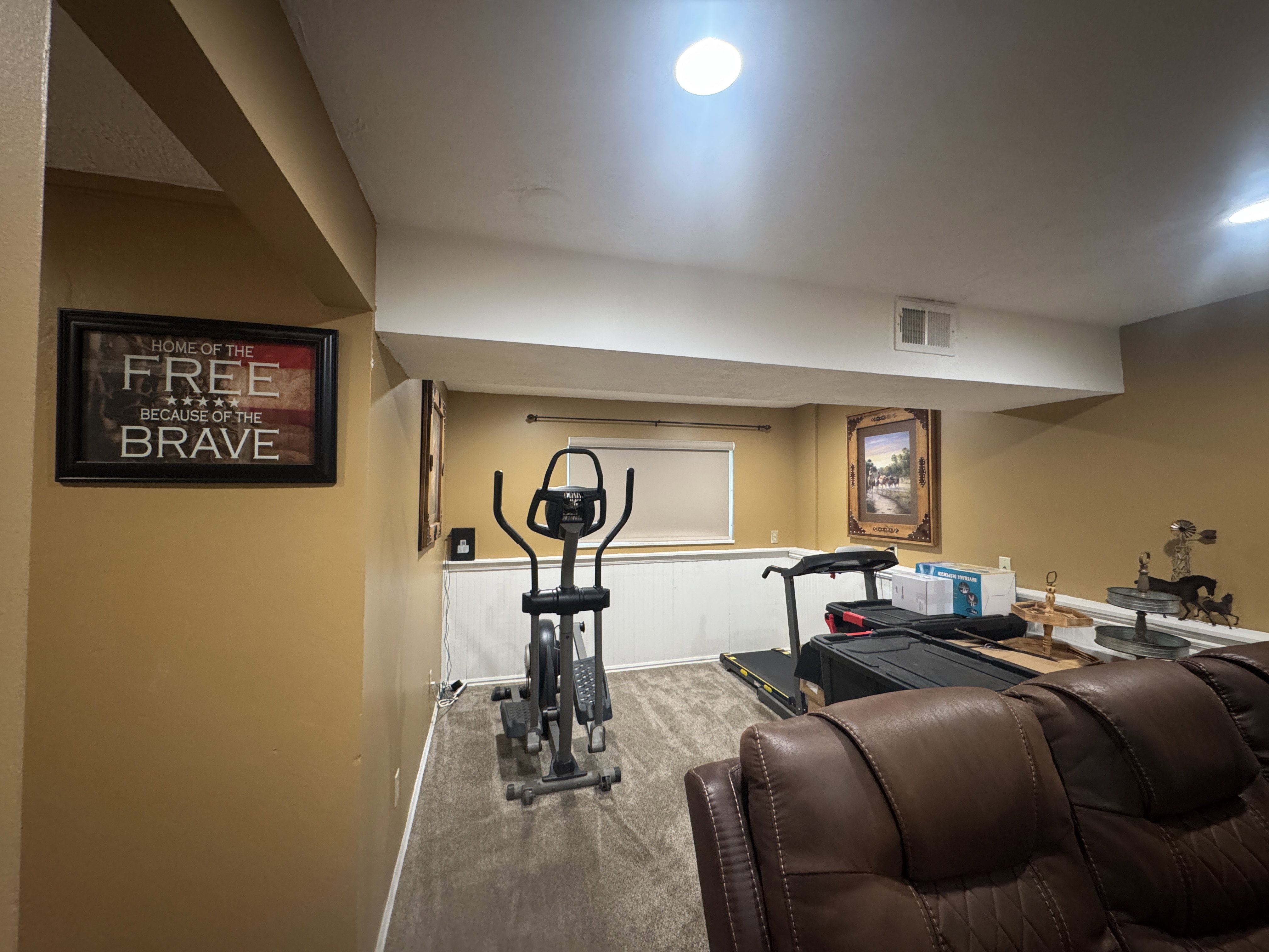 Versatile recreation room featuring recessed lighting, painted walls, and carpet flooring