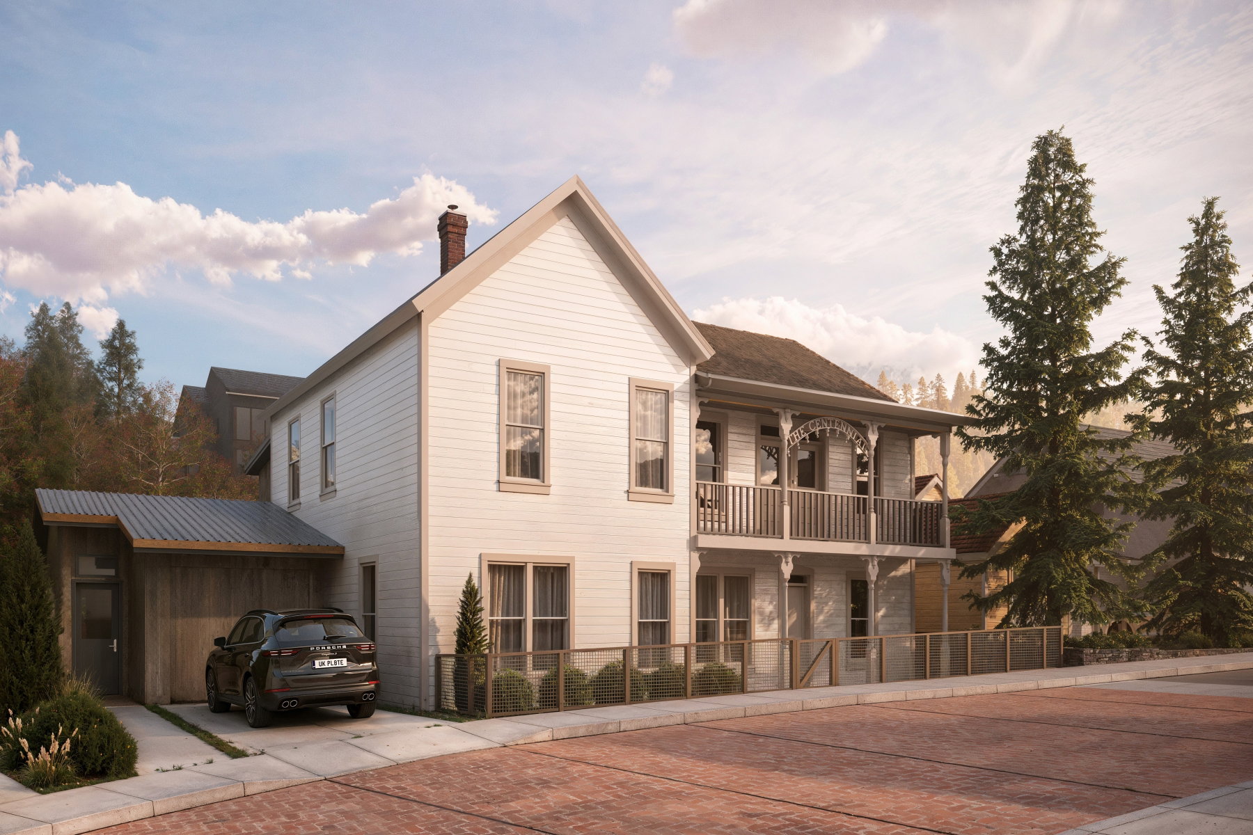 Traditional two-story residence featuring white siding and a prominent front balcony with intricate detailing