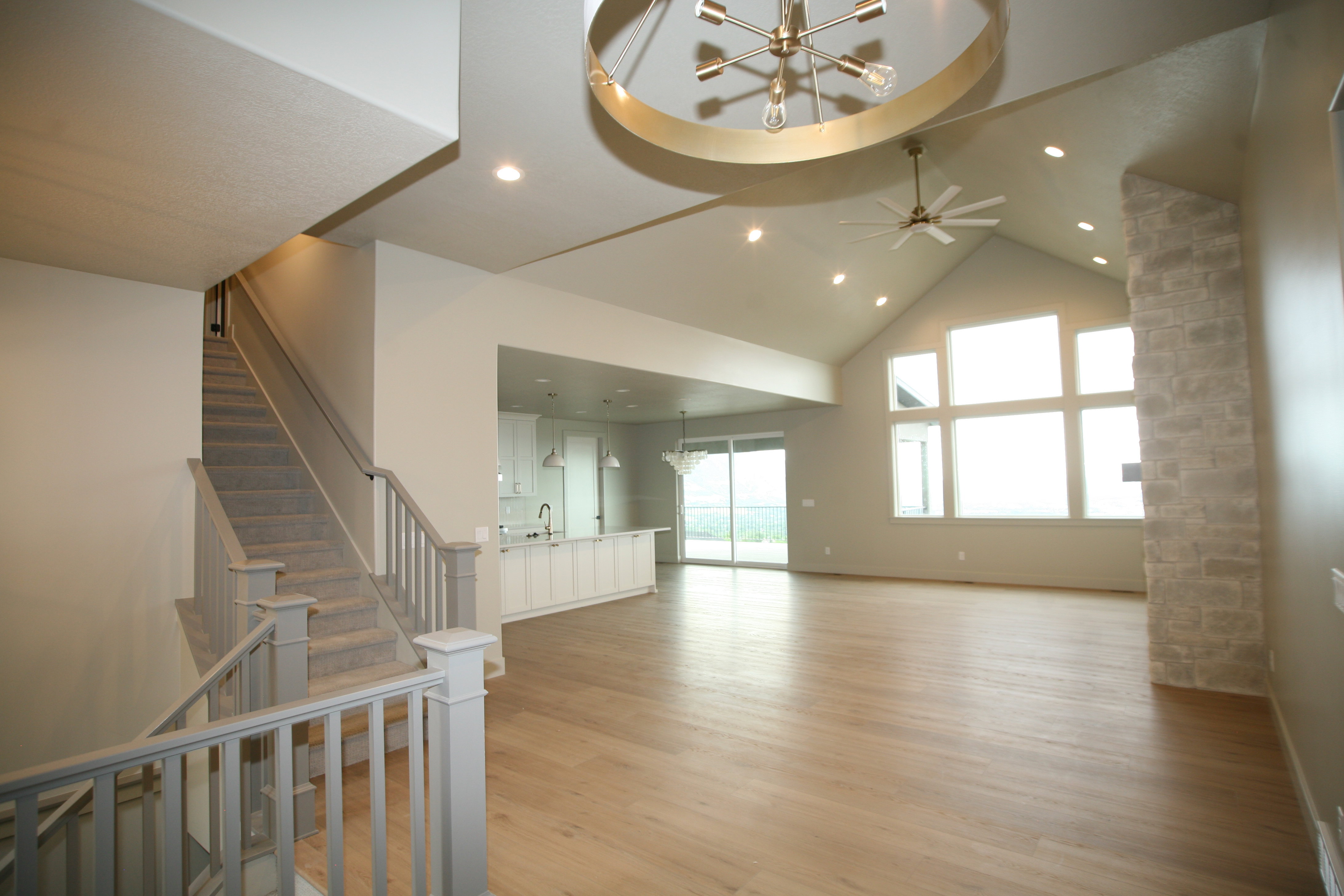 Light wood-finish flooring throughout the main living area