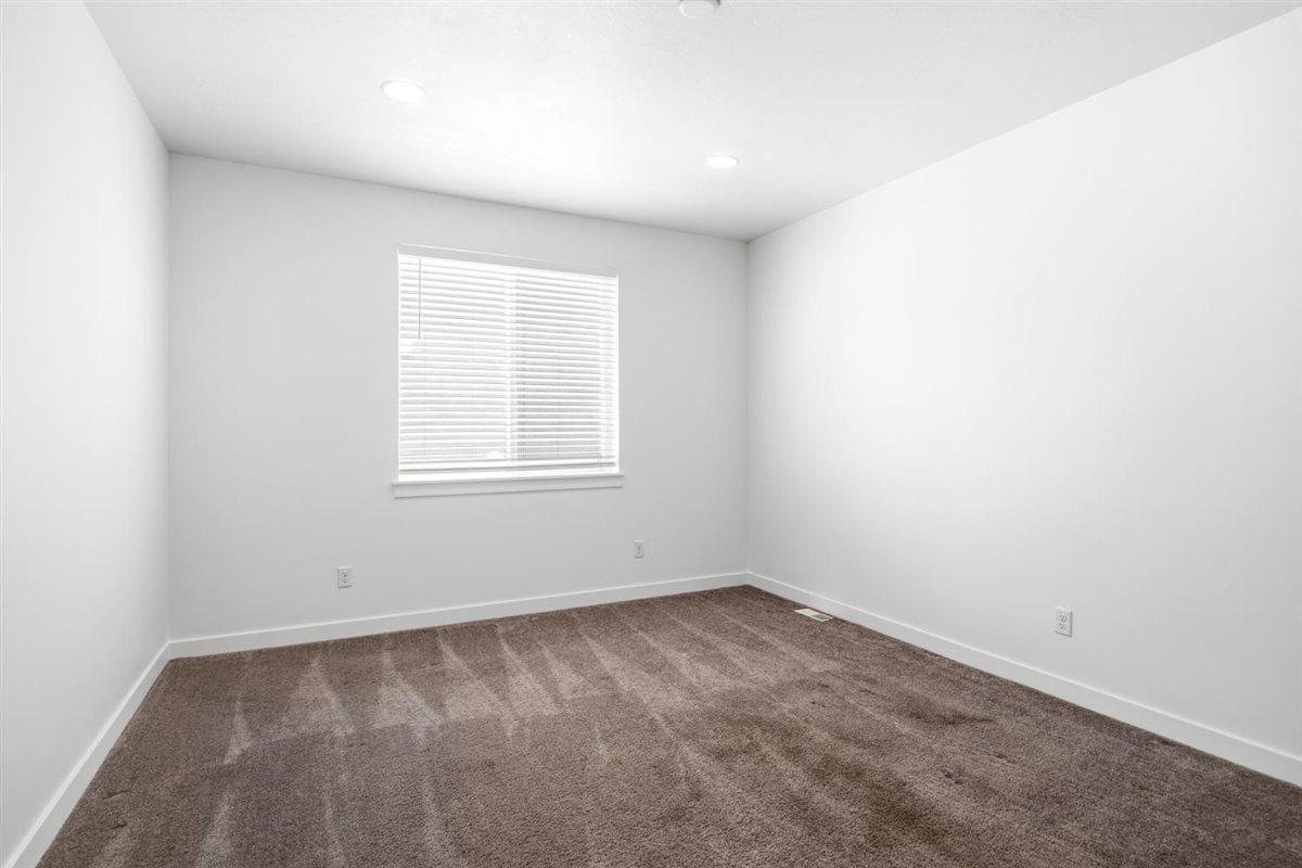 Paned French Doors lead to this flex space ie. music room, office space , exercise room