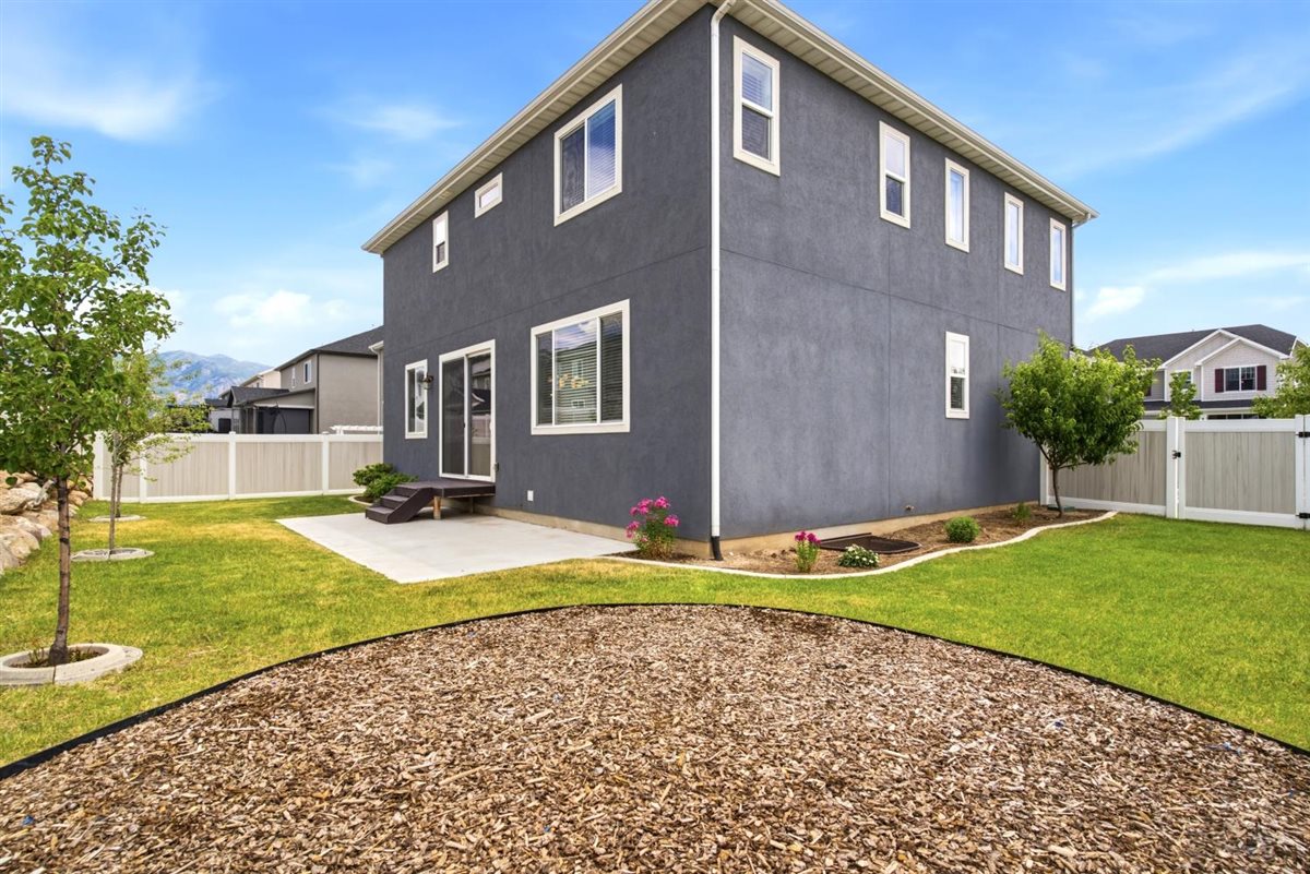 Fully fenced yard with full sprinklers