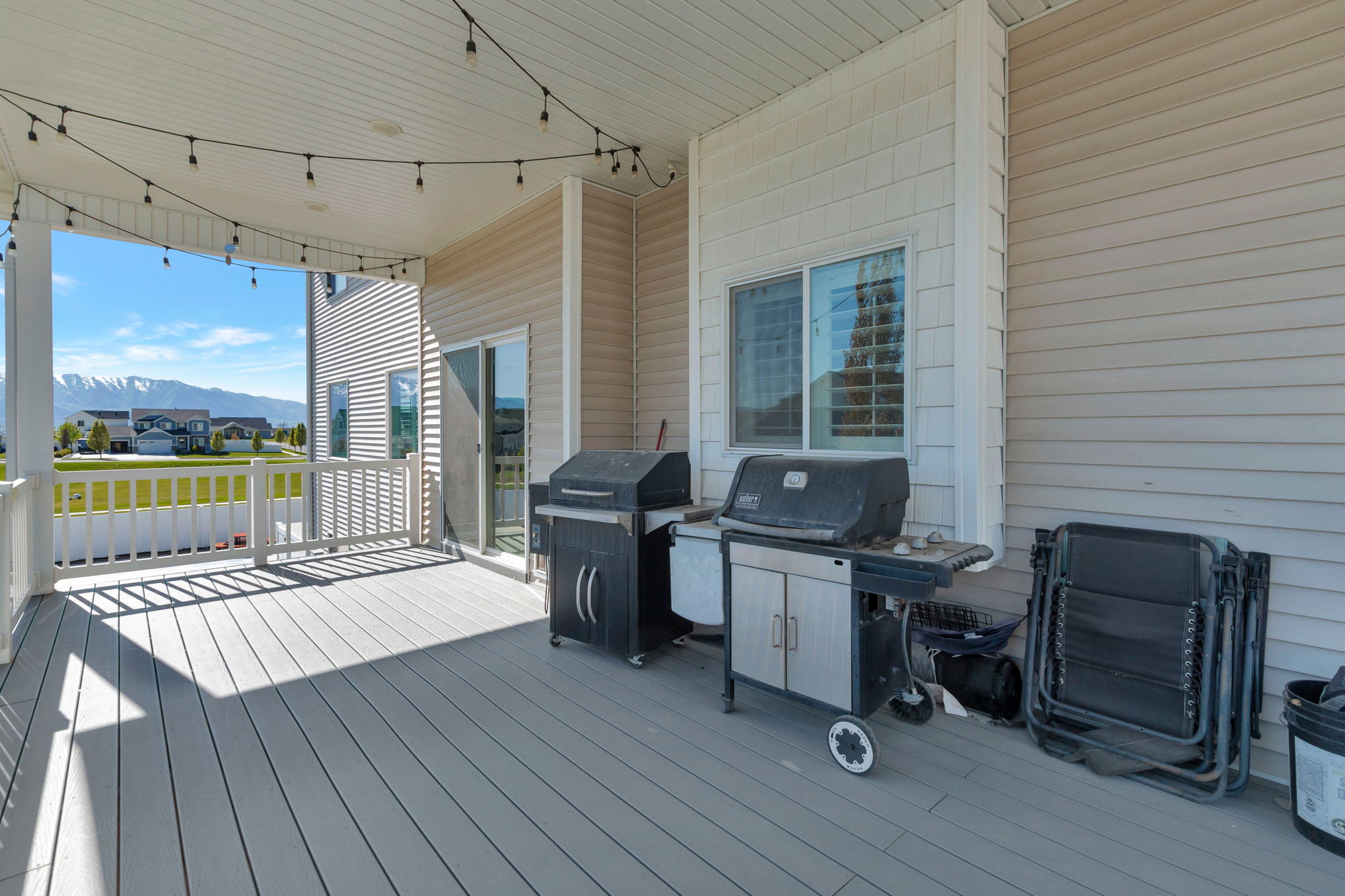 Covered outdoor deck with composite flooring