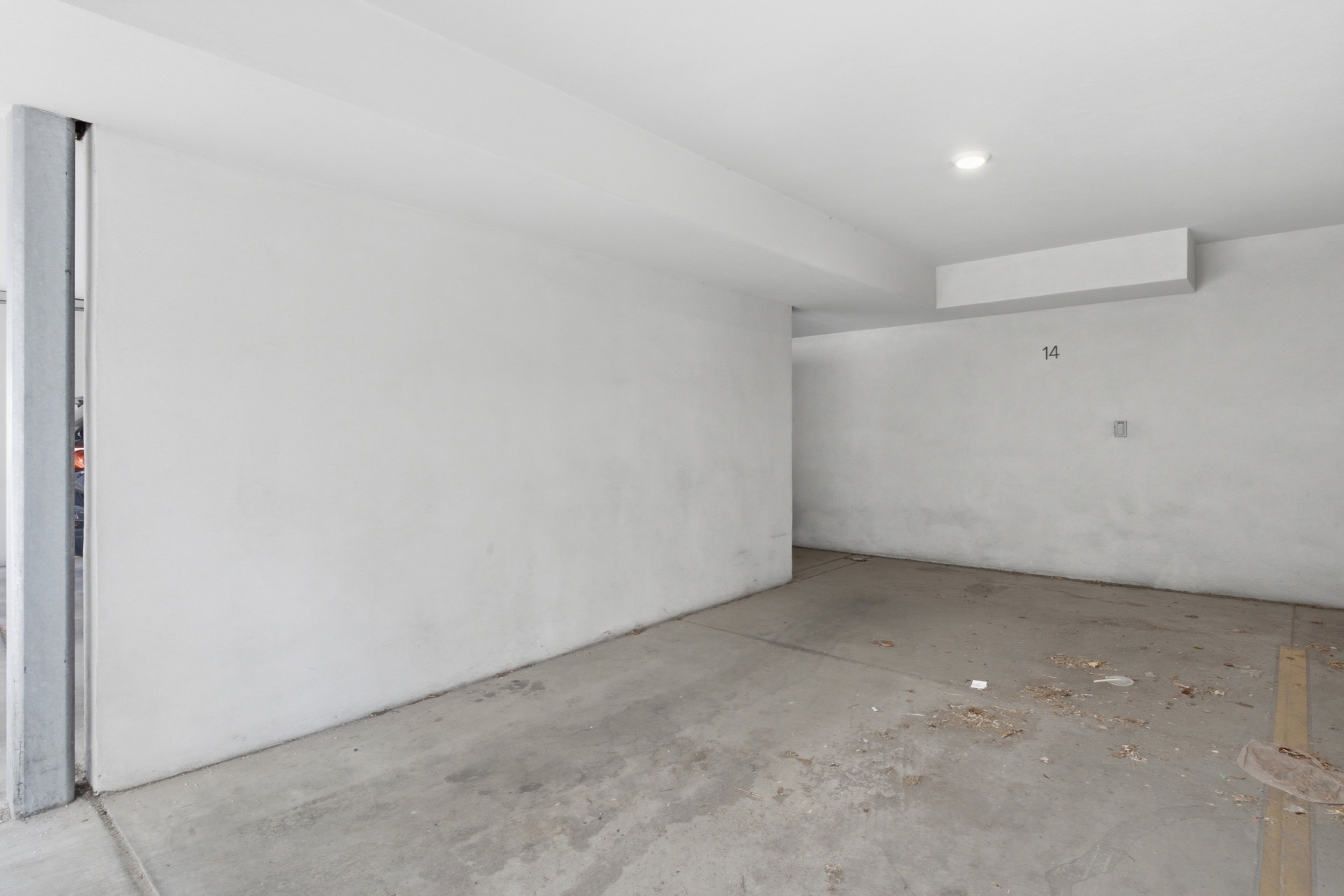 Dedicated carport under the building