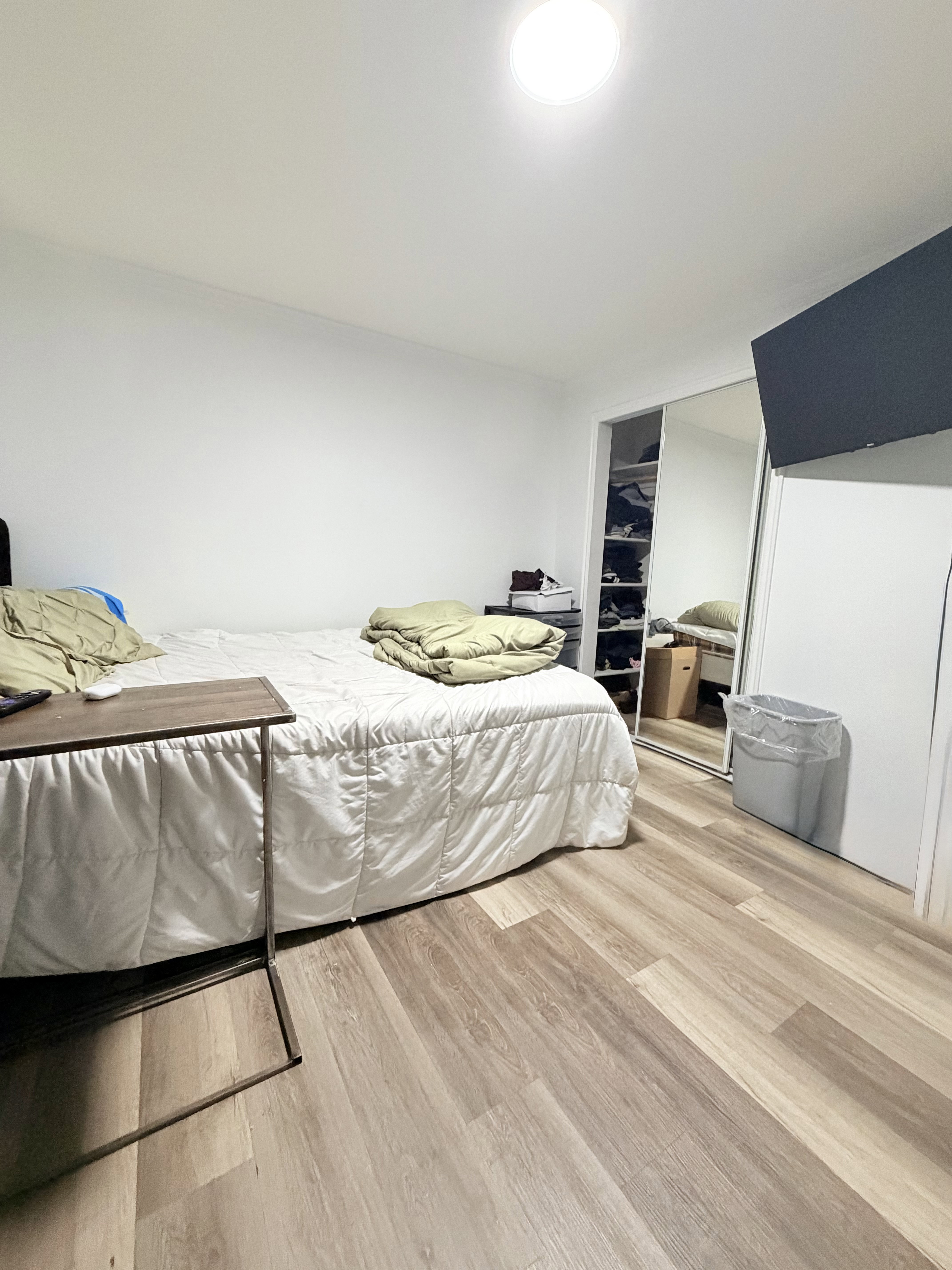 Bright room with light wood-finish flooring