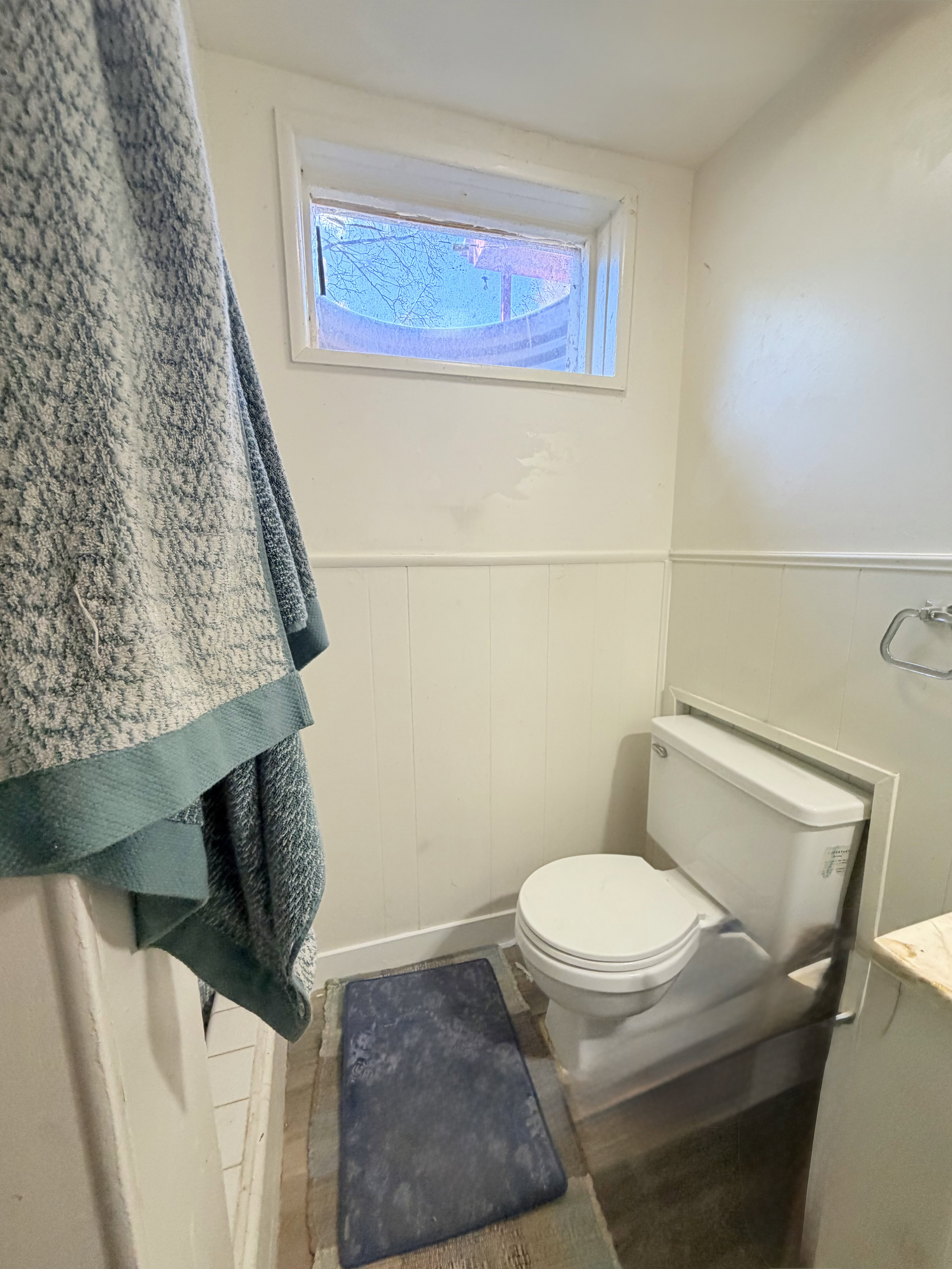 White paneling and neutral walls