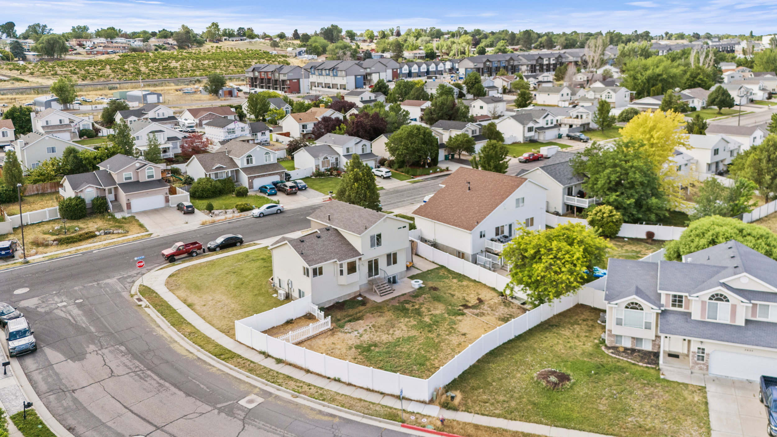 This aerial perspective showcases a residential neighborhood with diverse architectural styles