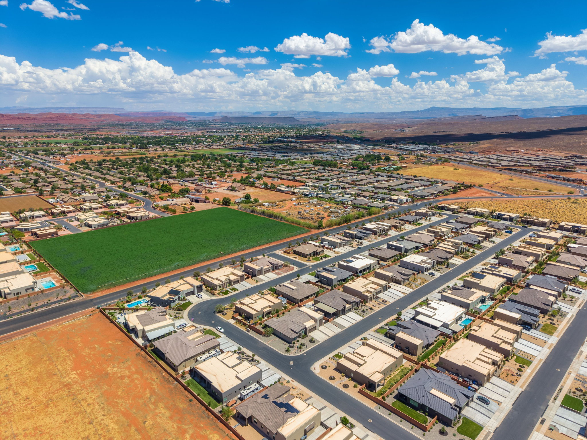 Aerial perspective showcasing a residential development with varied architectural styles