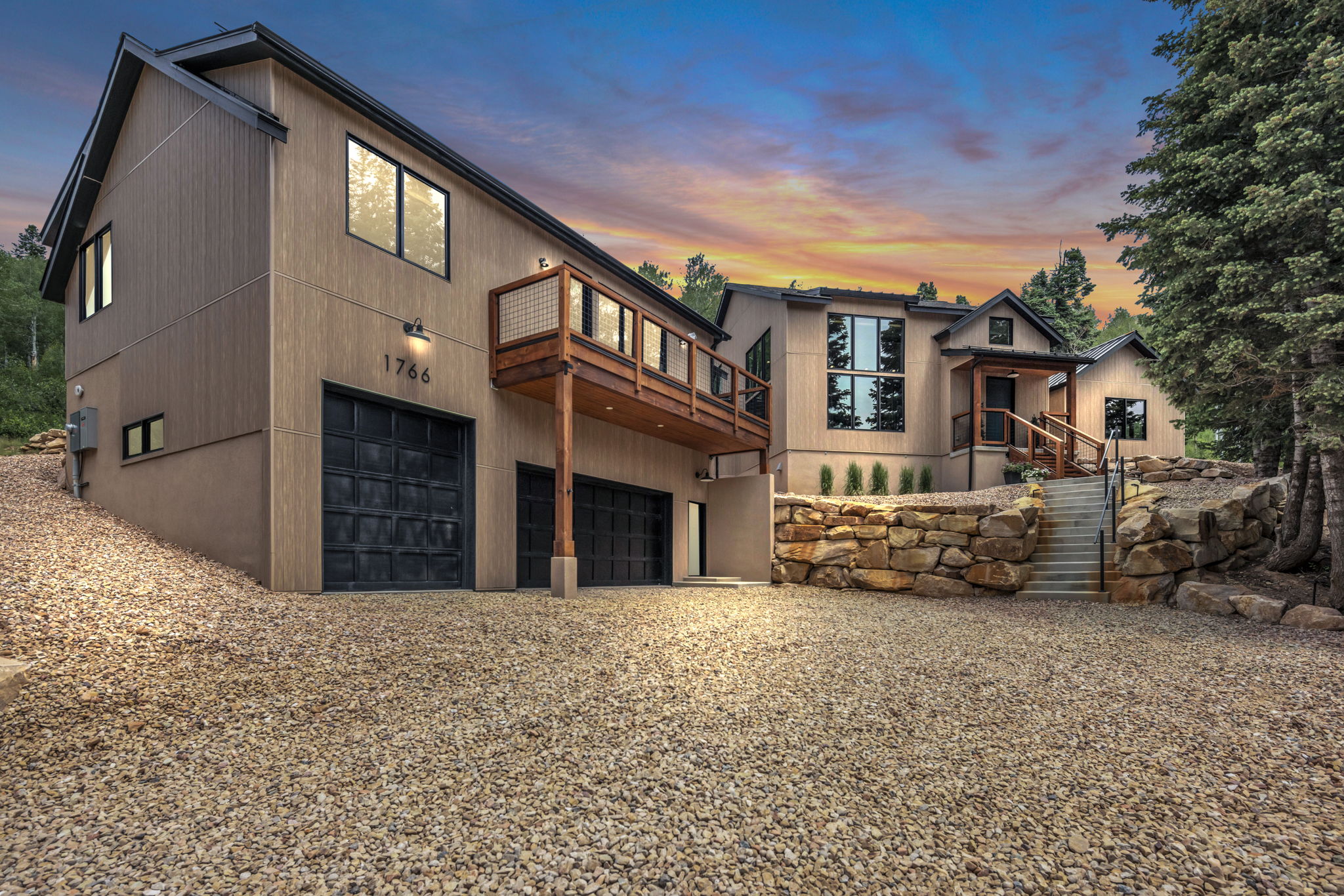 Modern architectural design featuring vertical siding and stucco finishes