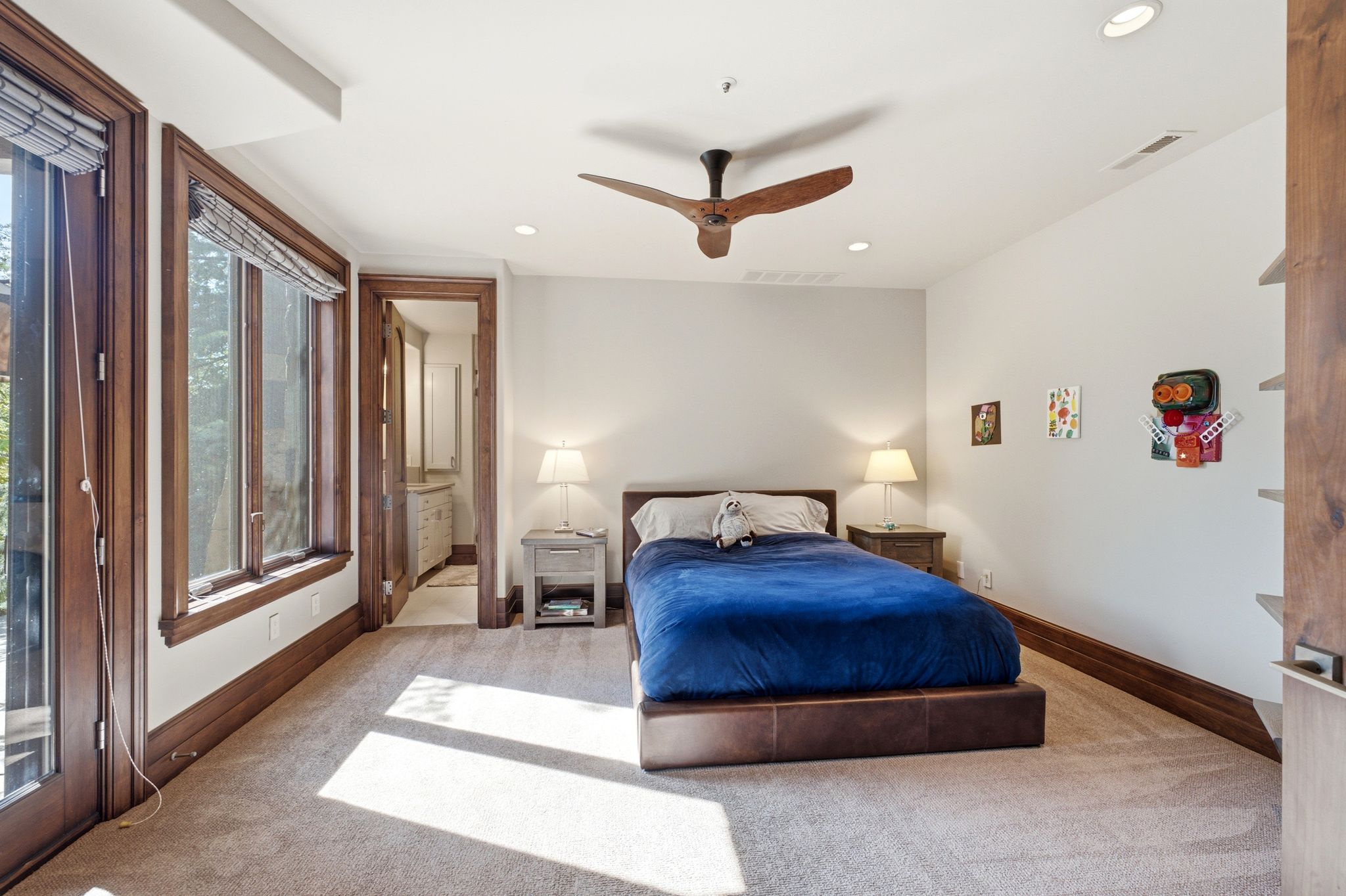 Spacious room featuring carpeting, recessed lighting, and a ceiling fan