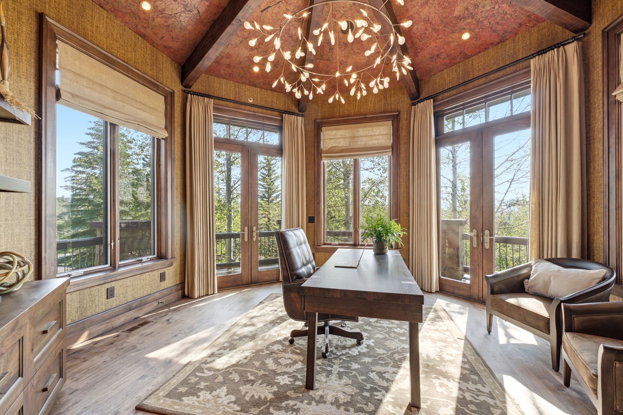 Vaulted wood-beam ceiling with an elaborate chandelier