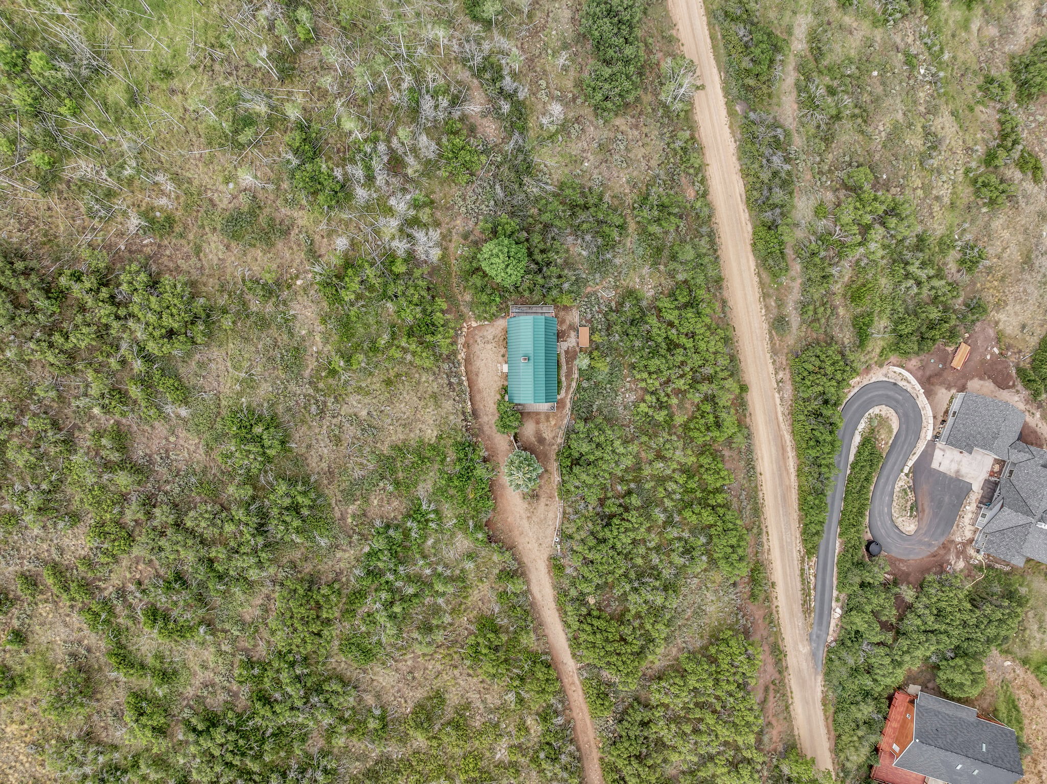 The cabin sits on a 1-acre parcel, and an adjacent 1-acre lot with a separate tax ID may be included with a reasonable offer, bringing the total property size to 2 acres.