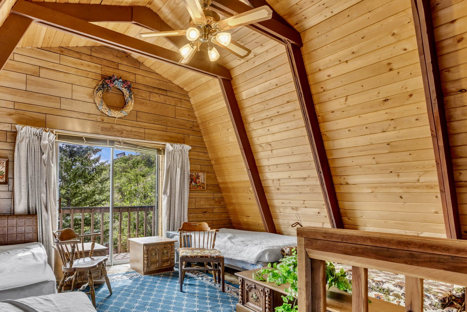 This spacious top floor den has comfortably served as a 3rd bedroom for visiting family.