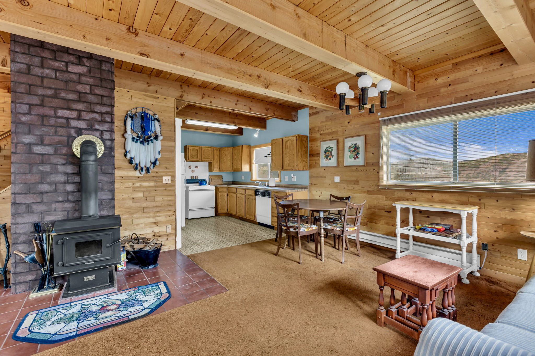 Wood-burning stove for added warmth and mountain charm.