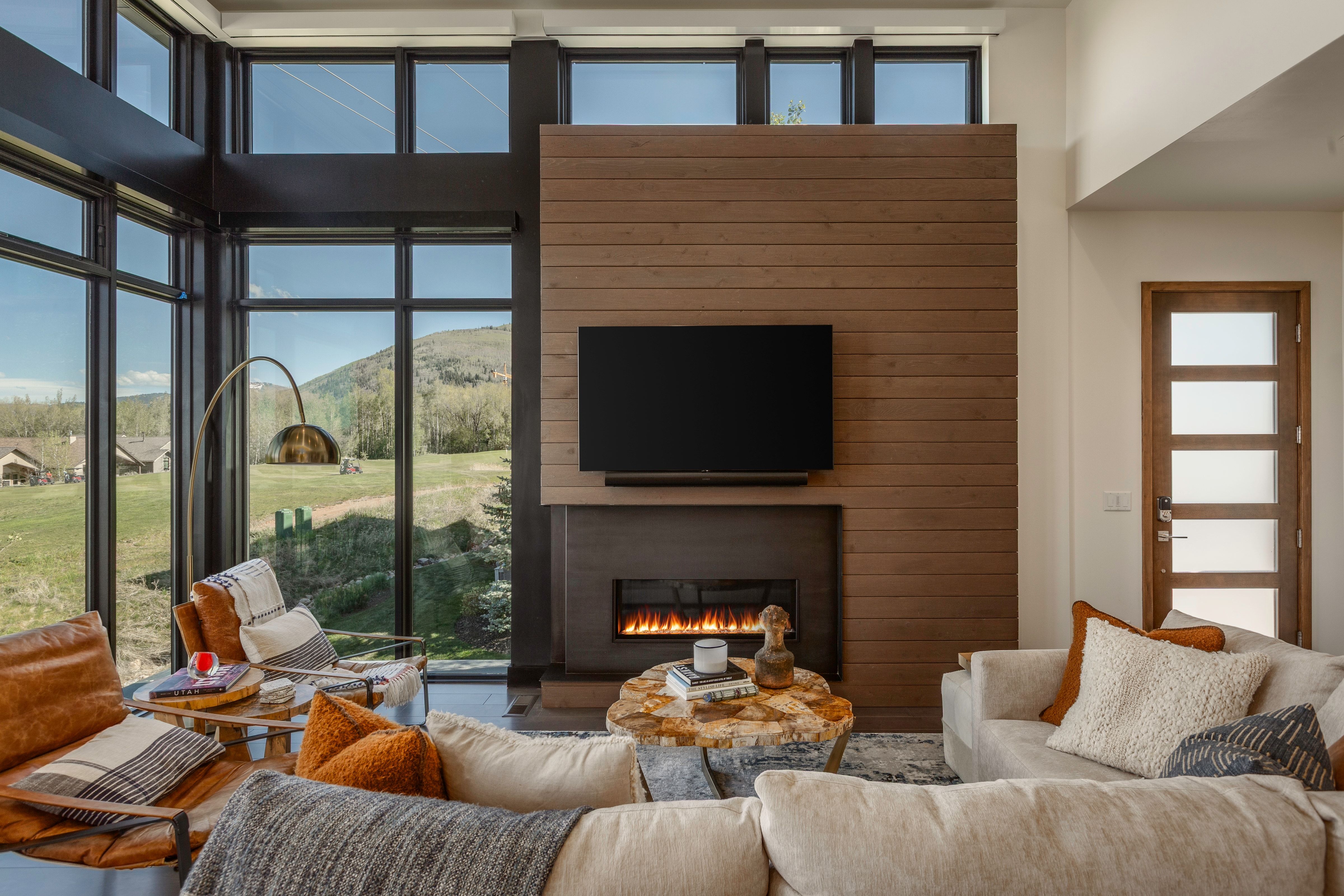 Double-height windows with black frames