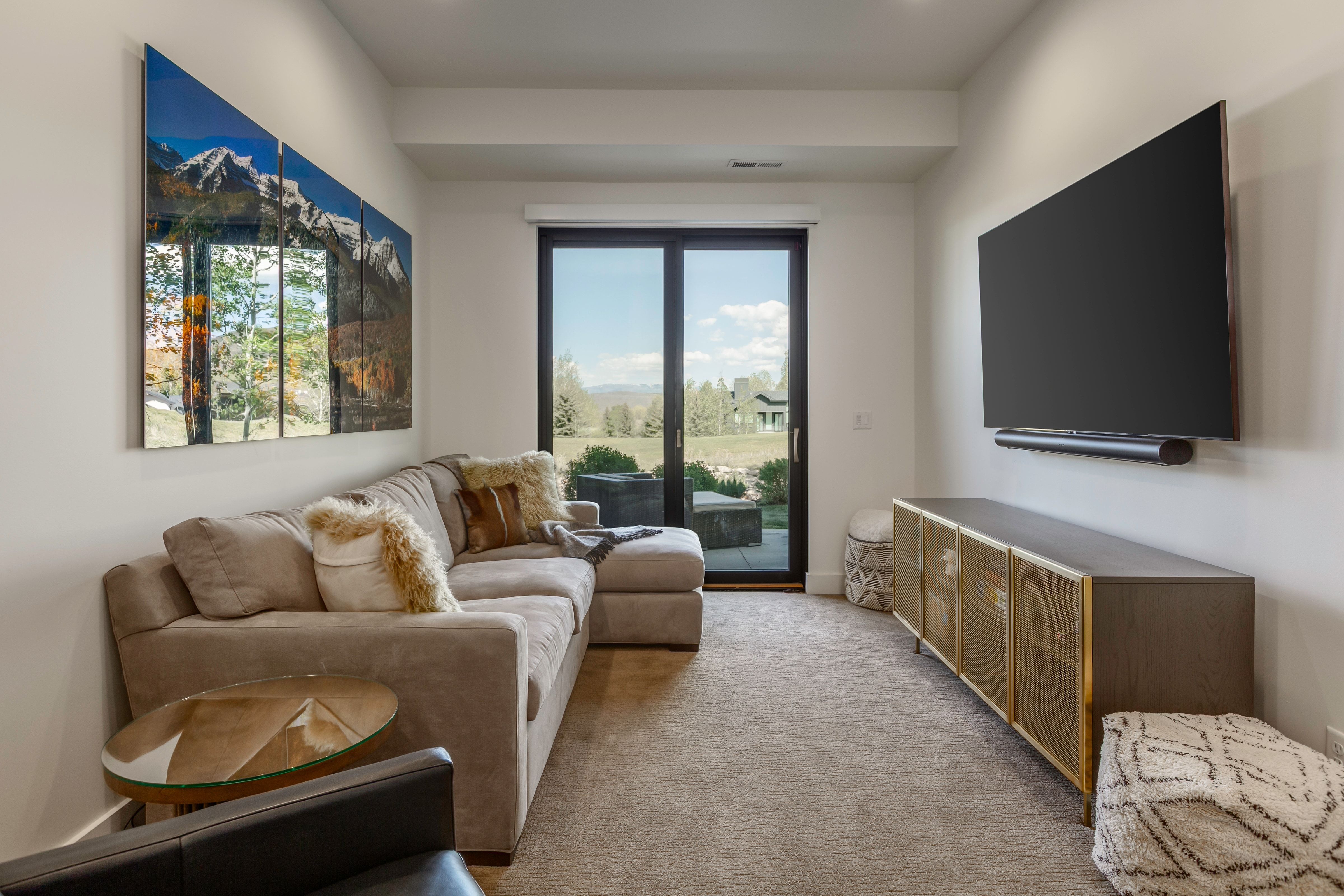 Sliding glass door opening to outdoor hardscaping