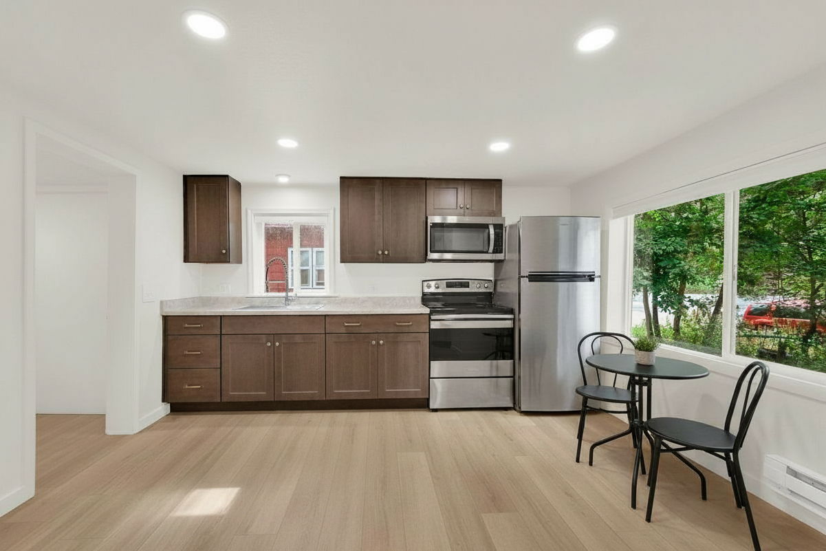 Beautiful kitchen with new cabinets, countertops and new stainless appliances. Virtually furnished.
