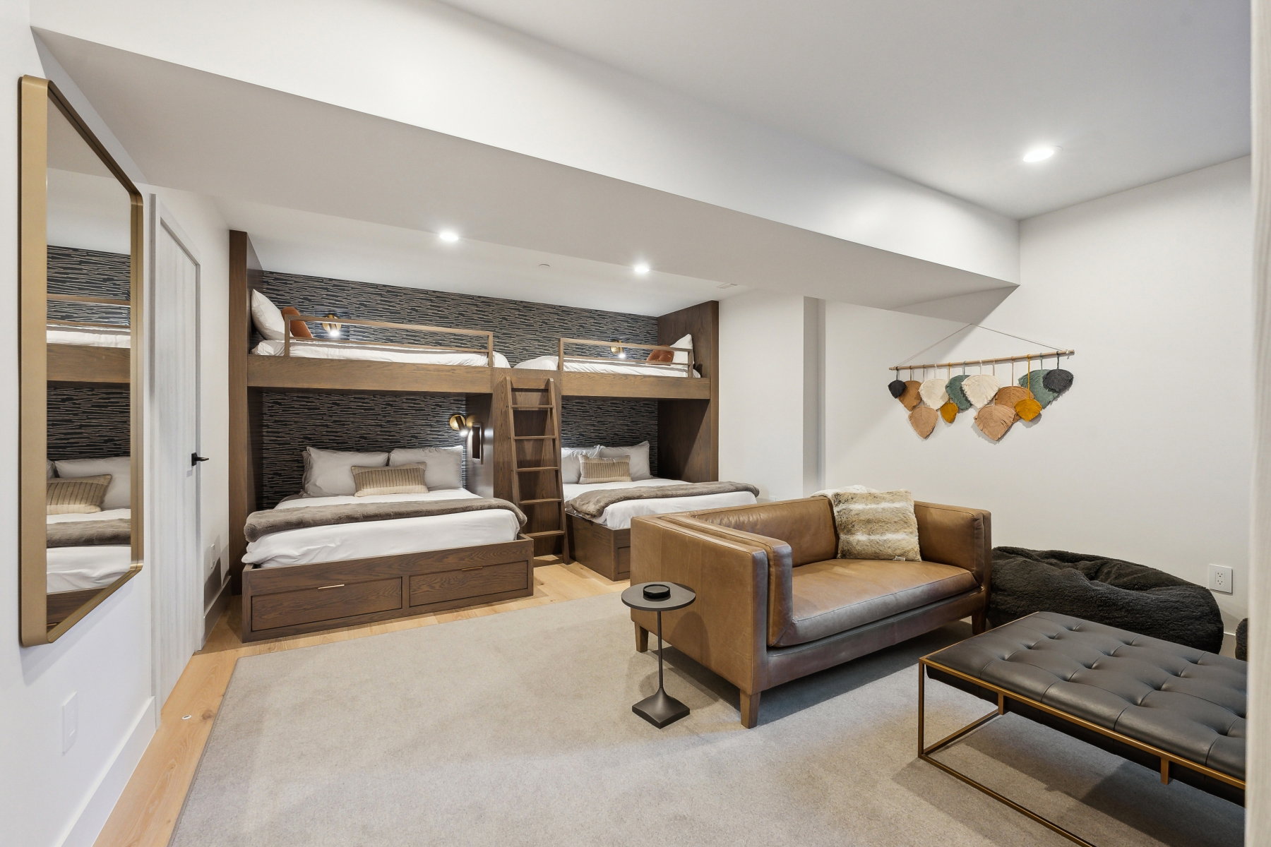 Custom built-in bunk beds with integrated lighting and drawer storage