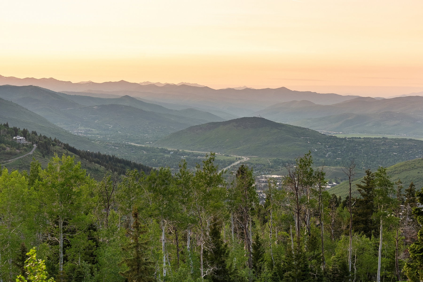 Expansive mountain landscape with a verdant valley below