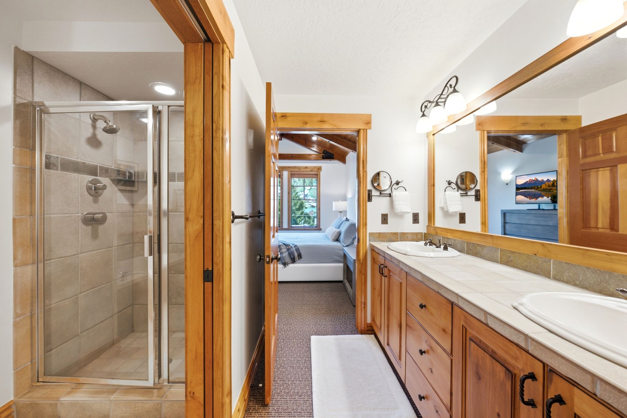 Primary Suite, double vanity, walk-in closet and separate tub and shower