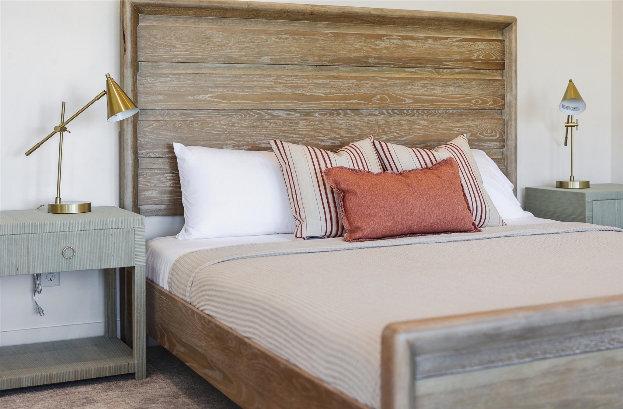 Wood-finish bed frame featuring a slatted headboard