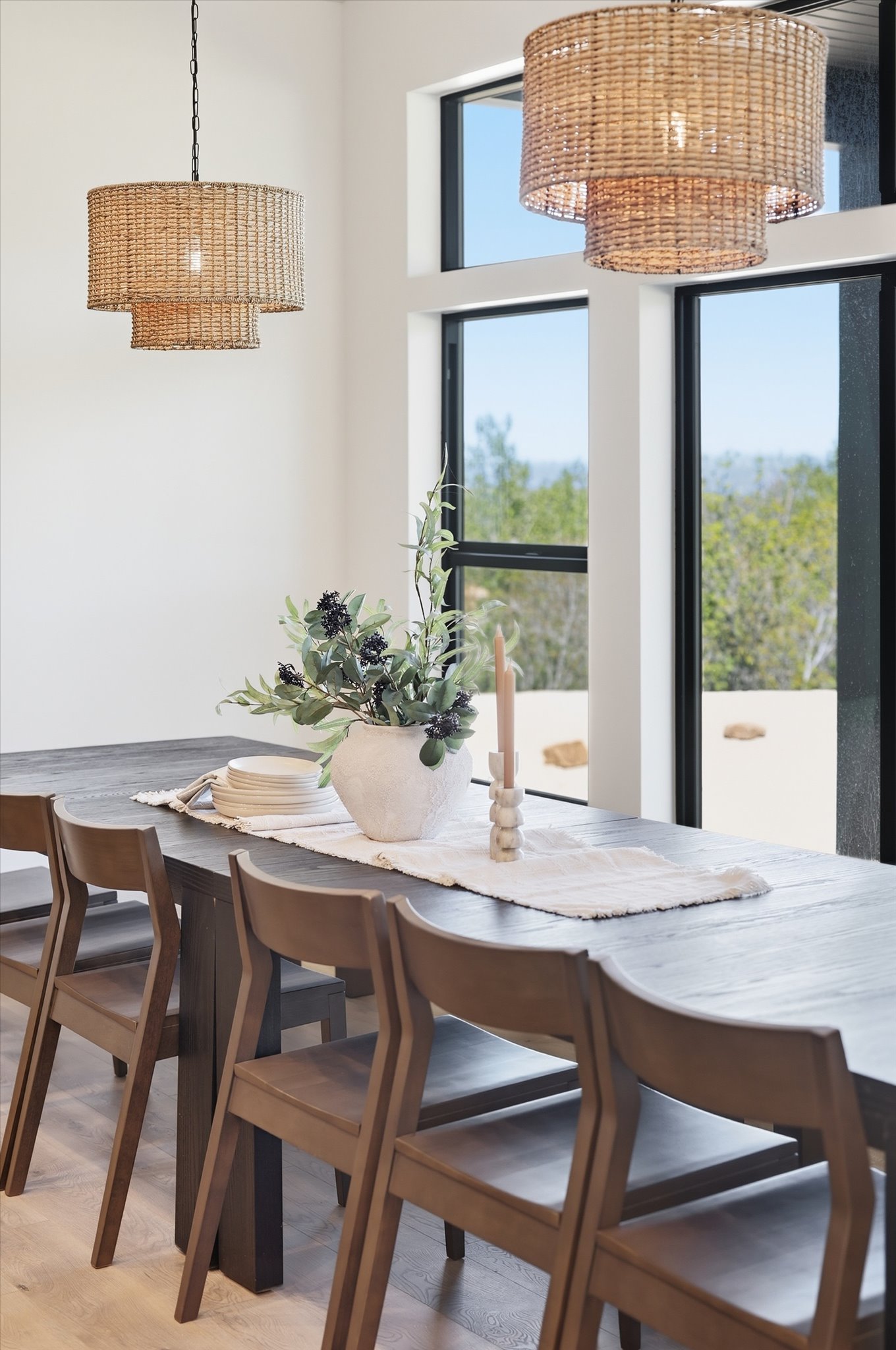 Dining area featuring a dark wood-finish table with coordinating chairs
