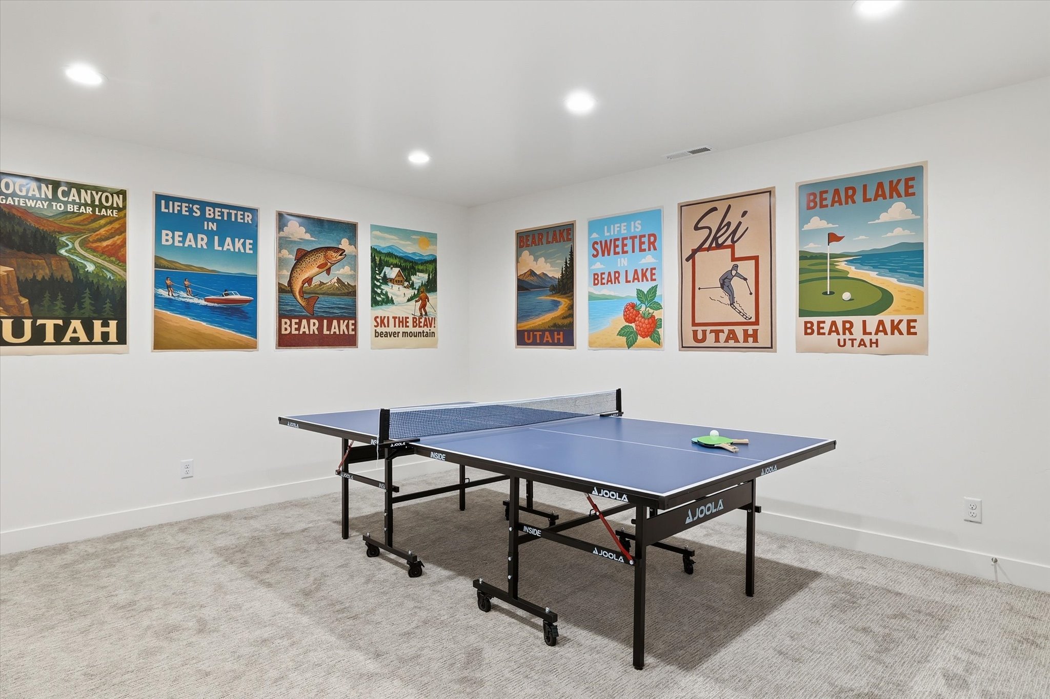 Spacious recreation room featuring recessed lighting and wall-to-wall carpeting