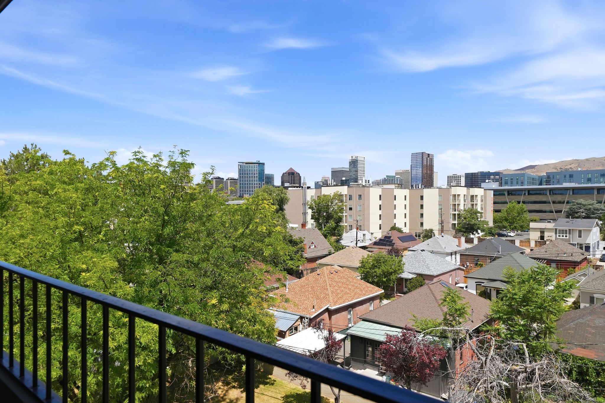 views of the mountains and downtown from the balcony.