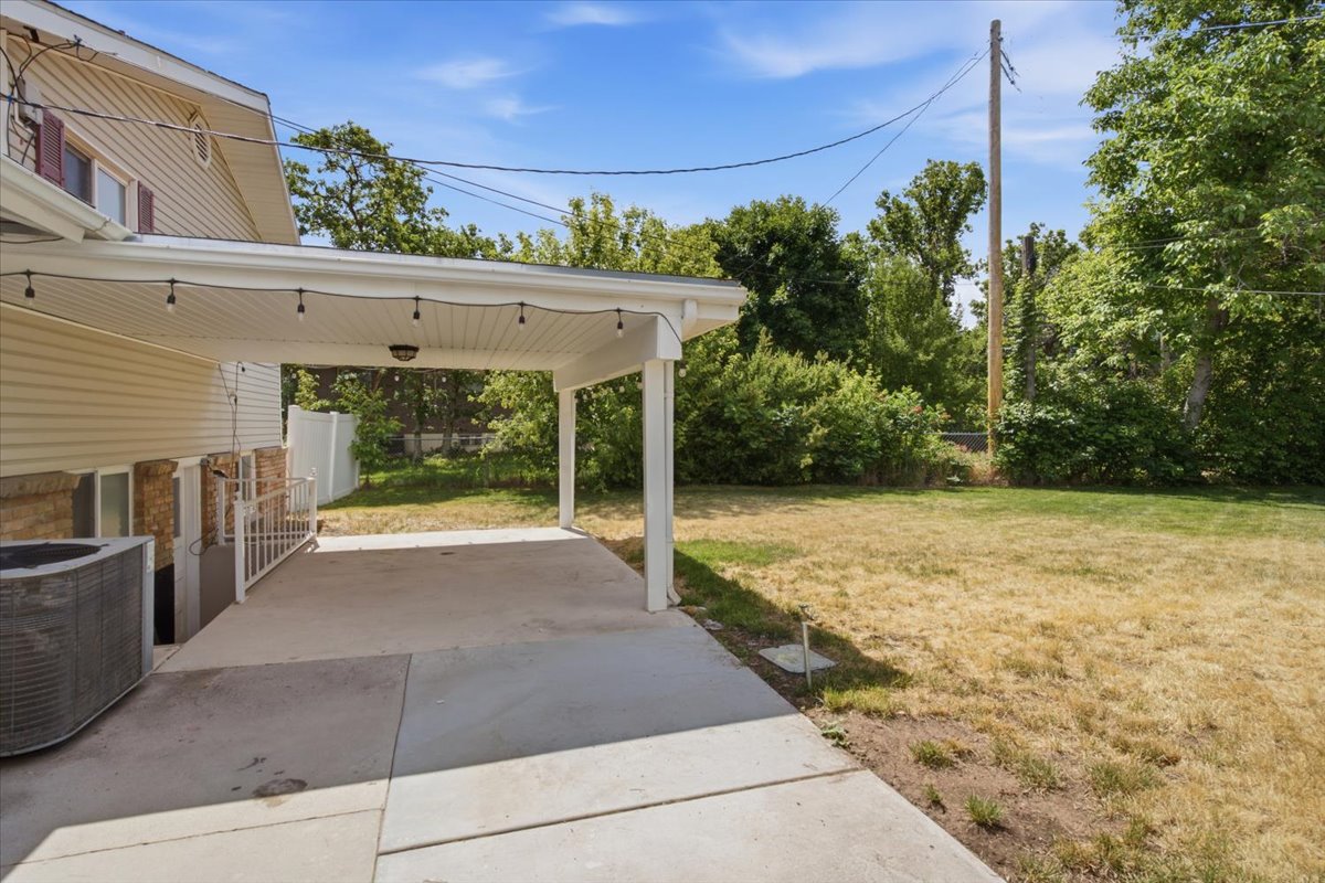 Covered patio with integrated lighting and a concrete surface