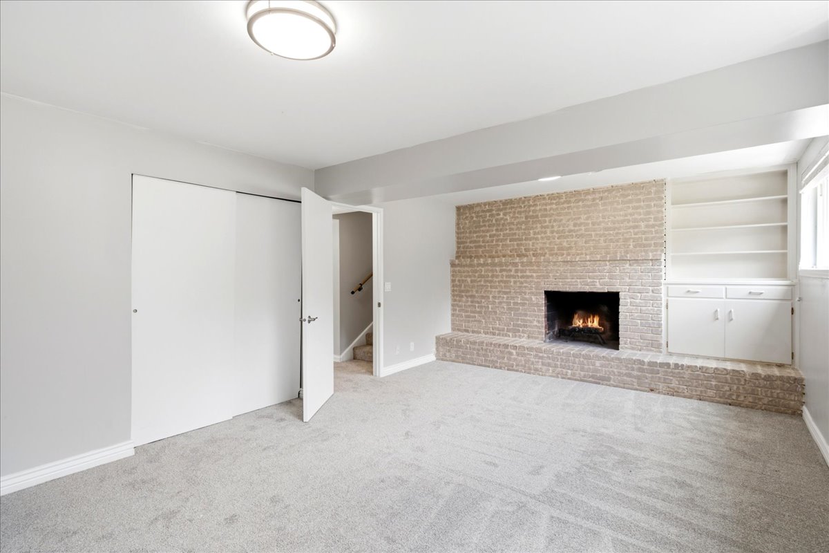 Brick-faced fireplace with hearth