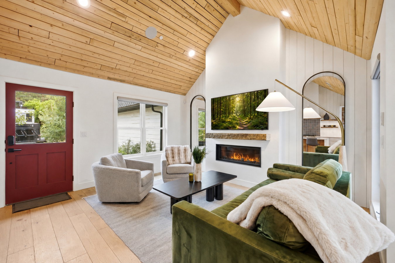 Vaulted wood-paneled ceiling with recessed lighting