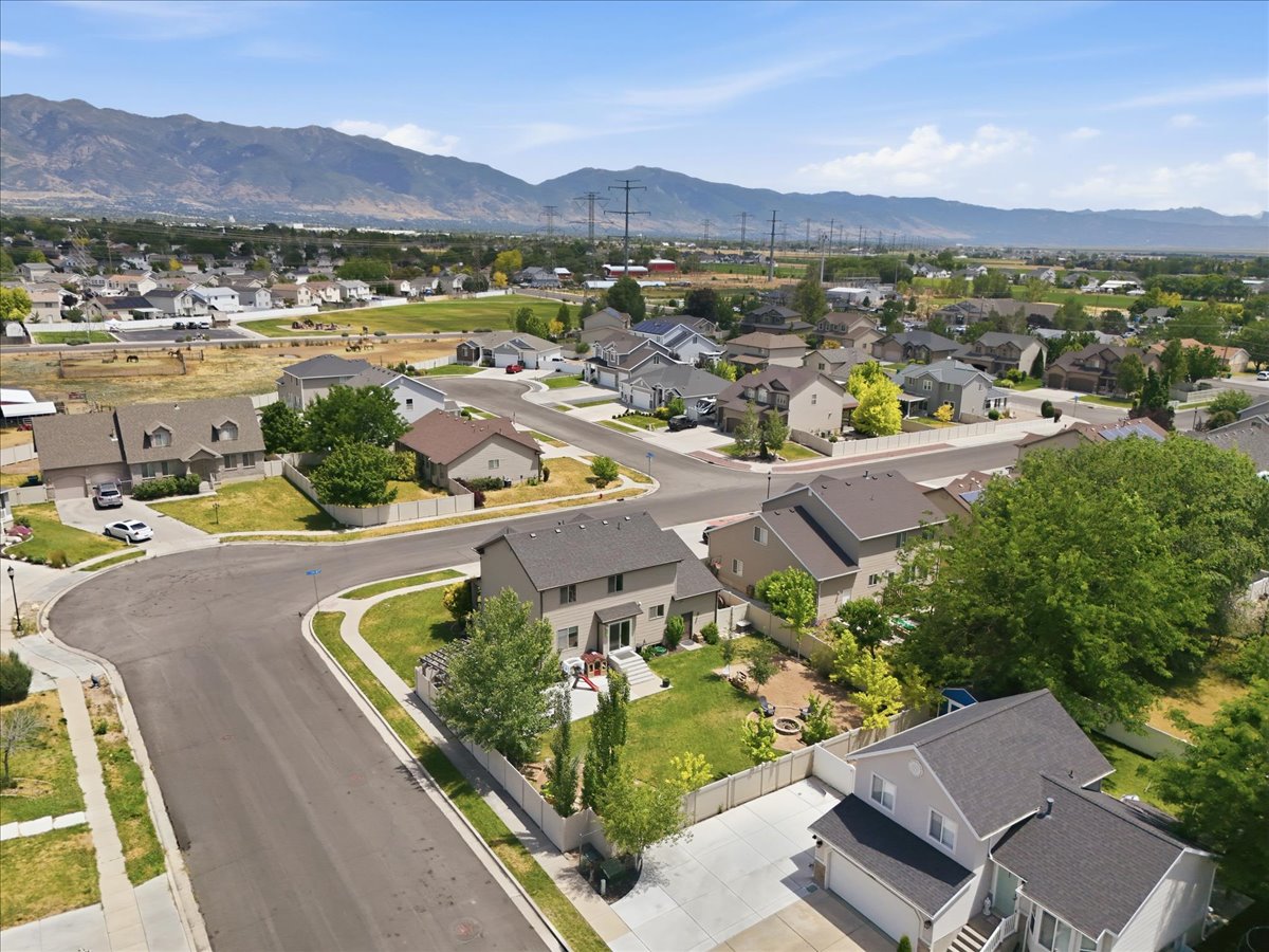 Residential neighborhood featuring a cul-de-sac and mountain backdrop