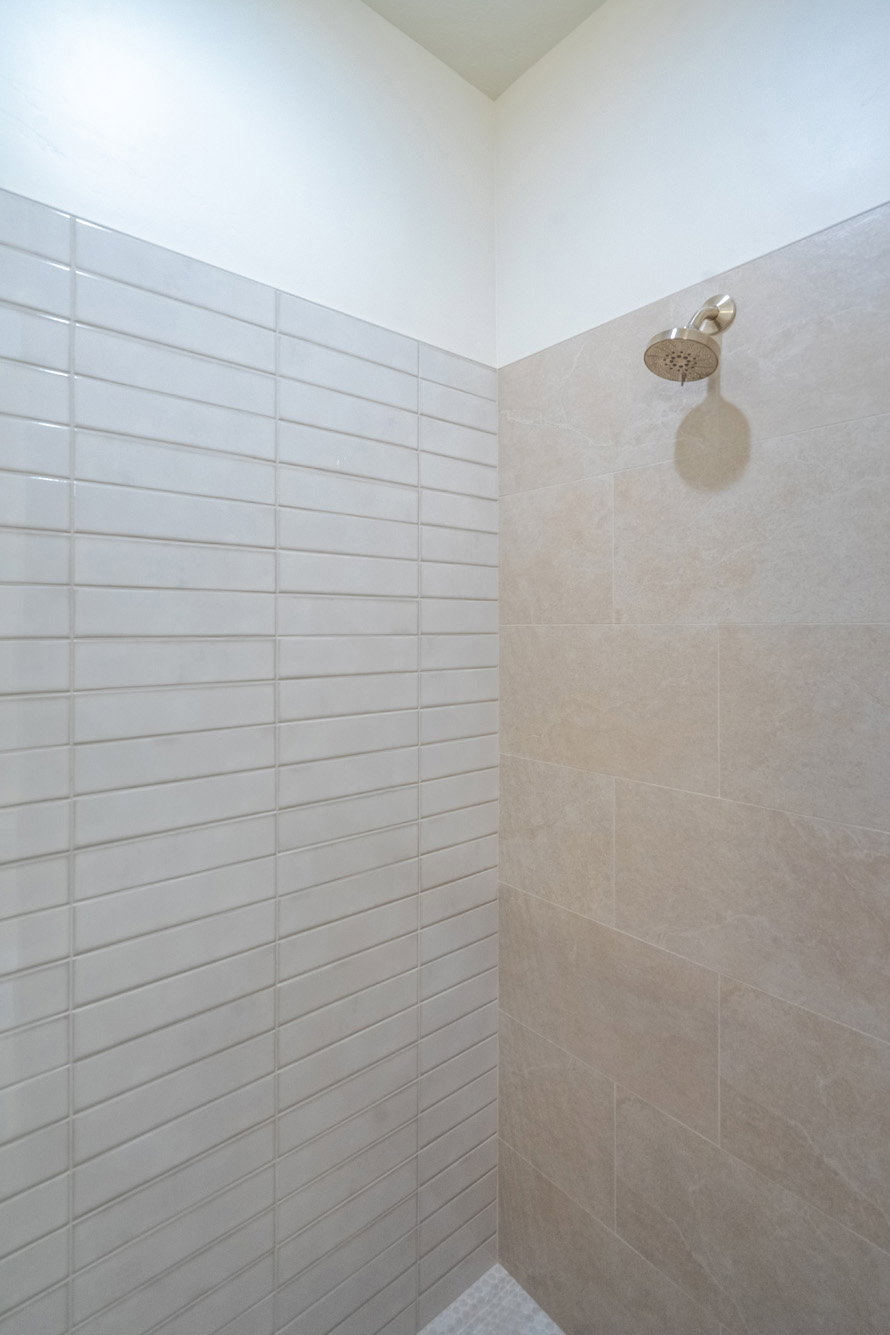 Bathroom with tiled shower
