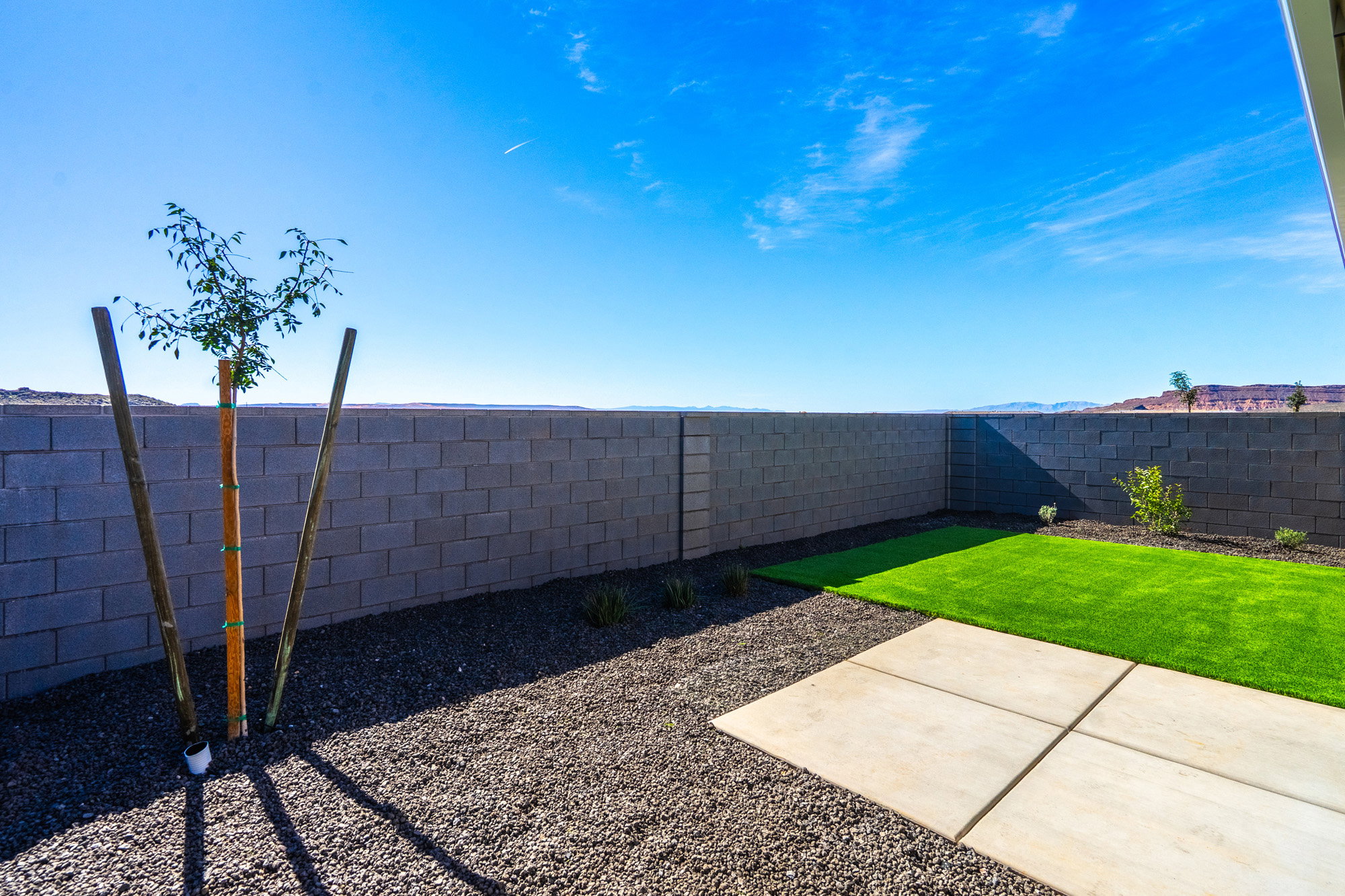 View of fenced backyard