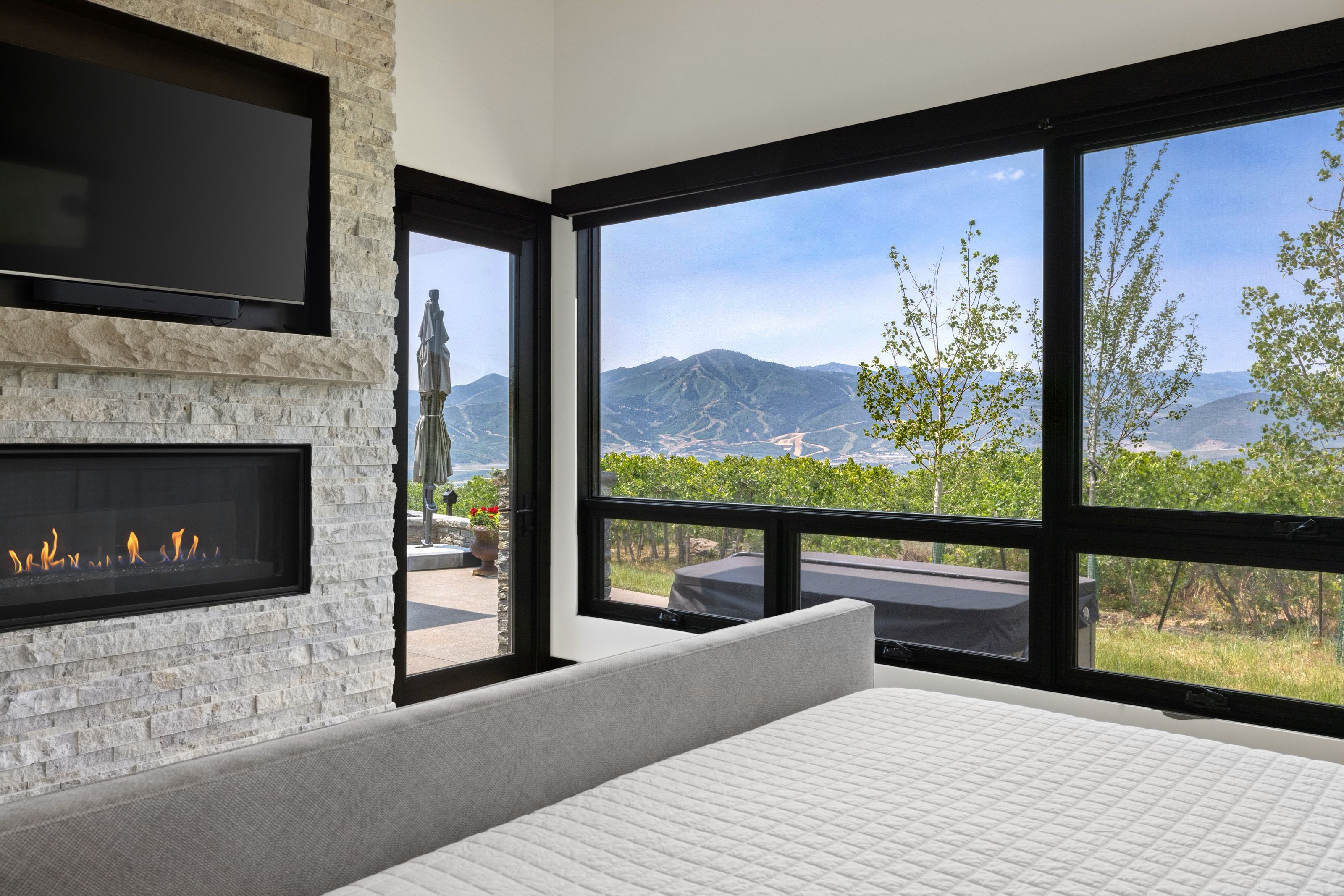 Expansive windows framing mountain scenery